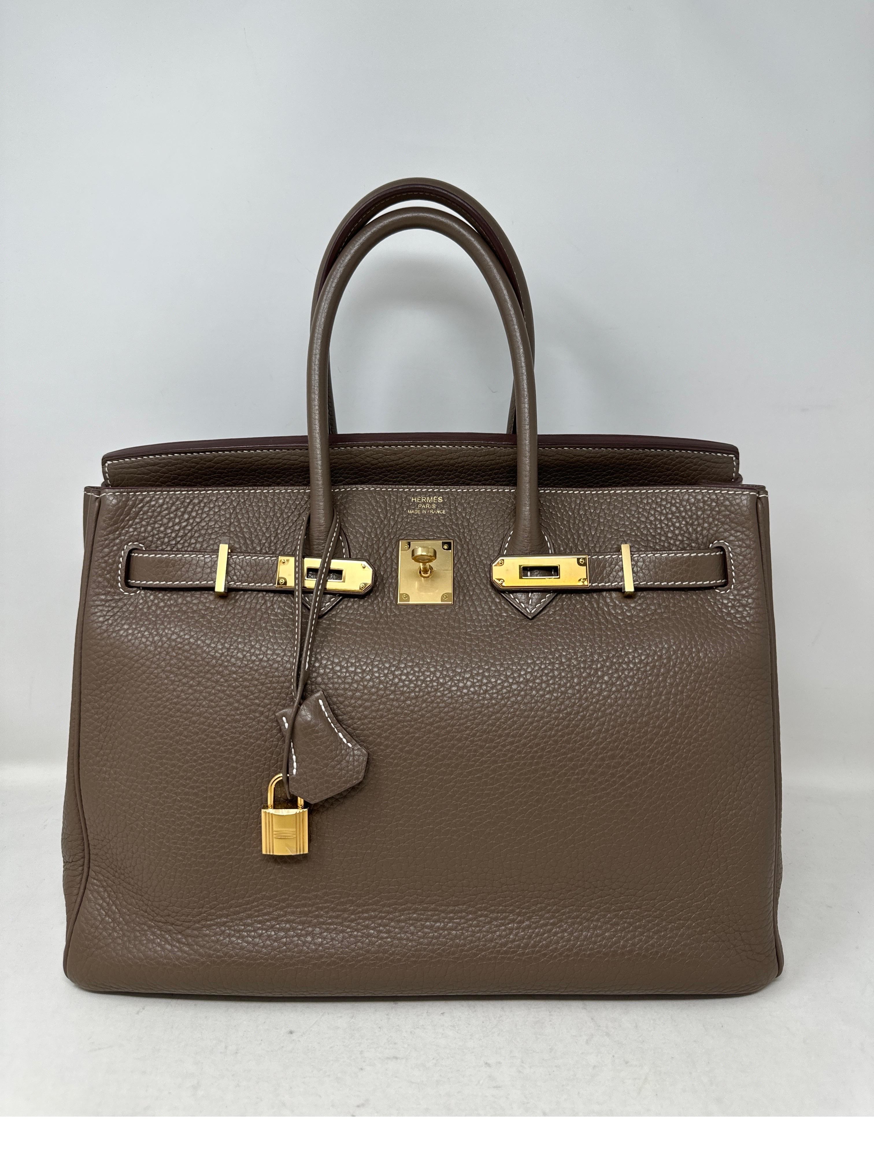 Hermes Etoupe Birkin 35 Bag. Excellent condition. Gorgeous grey tan color. Hard to find combination. Gold hardware too. Clemence leather. Great investment bag. Includes clochette, lock, keys, and dust bag. Guaranteed authentic. 