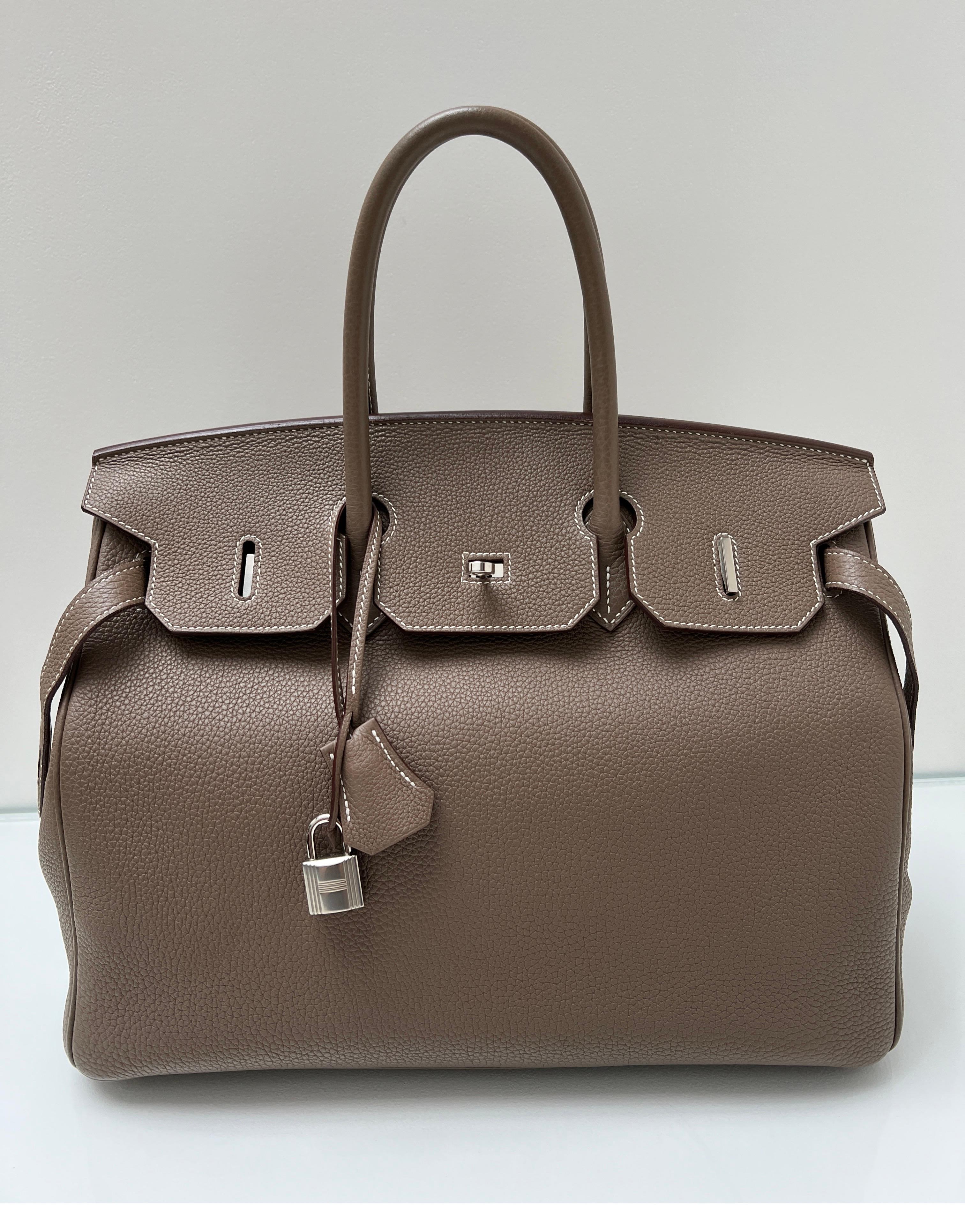 Hermes Etoupe Birkin 35 Bag. Excellent condition. Neutral and beautiful grey color. Goes with everything. Interior clean. Bag looks like new condition. Newer bag. Includes clochette, lock, keys, and dust bag. Guaranteed authentic. Don't miss out on