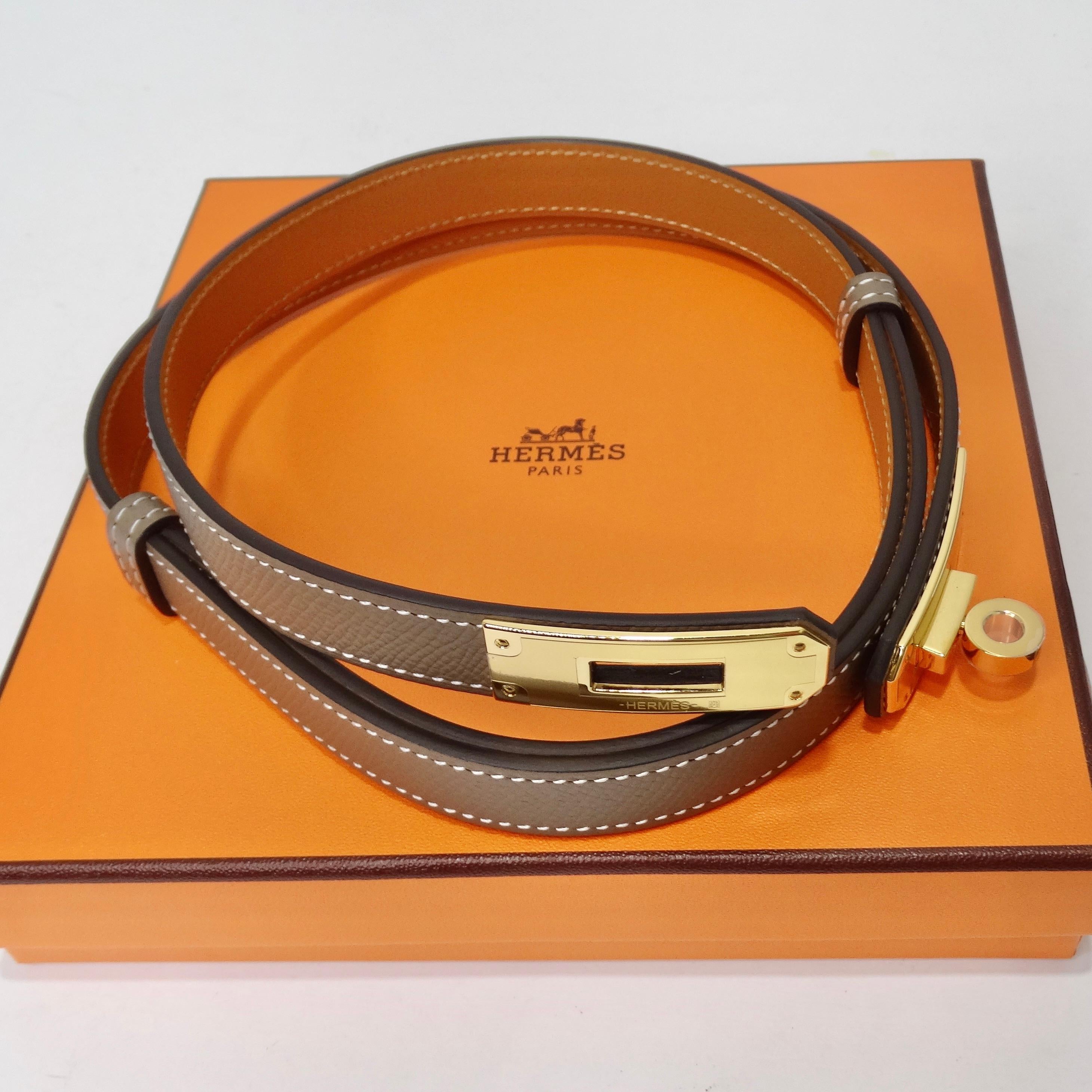 On the hunt for your next go-to belt? Hermes has you covered with this gorgeous taupe leather Kelly buckle! Calfskin Leather belt in Hermes’s Etoupe Epsom with an eye catching gold plated Kelly buckle. Due to the convenient sliding system, this