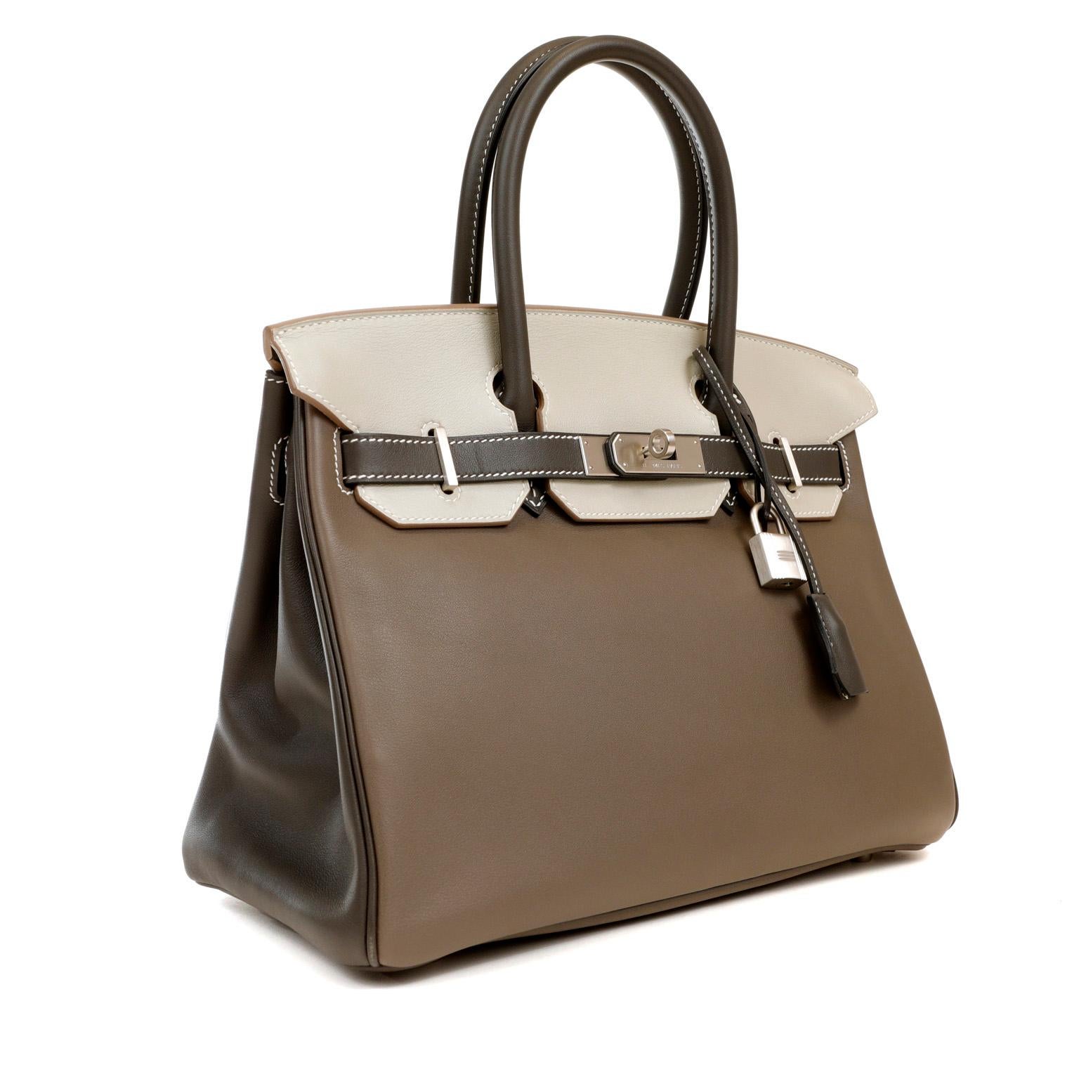 This authentic Hermès Tri Color Swift Leather 30 cm Birkin is in excellent condition. 
Long waitlists are commonplace for the intensely coveted classic leather Birkin bag.  Each piece is hand crafted by skilled artisans and represents the epitome of