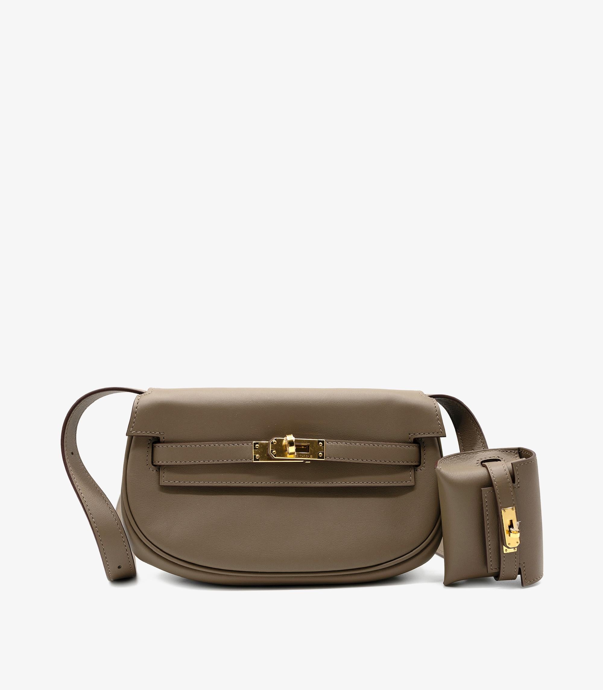 Hermès Etoupe Swift Leather Kelly Moove

Product Details
Xupes Ref: BB007
Brand: Hermès
Model: Kelly Moove
Type: Shoulder, Crossbody, Belt Bag, Clutch
Serial Number: B
Age: 2023
Accompanied By: Hermès Dust Bag, Box, Protective Felt, Care Booklet,
