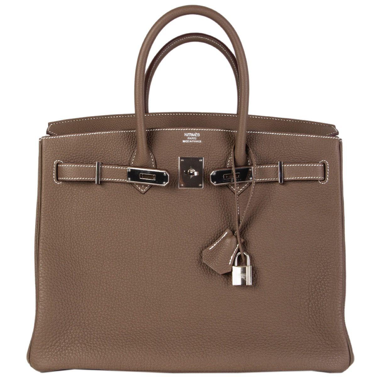 Hermès 'Birkin 35' bag in Etoupe (taupe) Veau Togo leather with palladium hardware. Lined in Chevre (goat skin) with an open pocket against the front and a zipper pocket against the back. Brand new. Comes with keys, lock, clochette, dust bag and