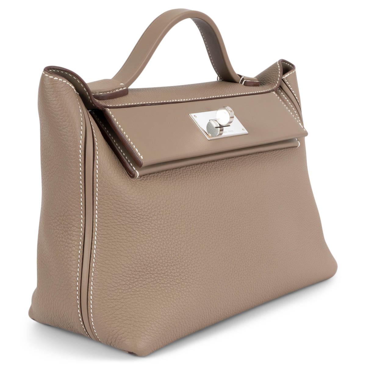 100% authentic Hermès 24/24 29 Bag in Etoupe Togo and Swift leather with a slip pocket at the back. Opens with a turn-lock in Palladium and is lined in Etoupe Swift with one zipper pocket against the back. Has been carried once or twice and is in