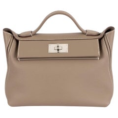 HERMES Etoupe taupe Togo & Swift cuir 24/24 - 29 Sac épaule