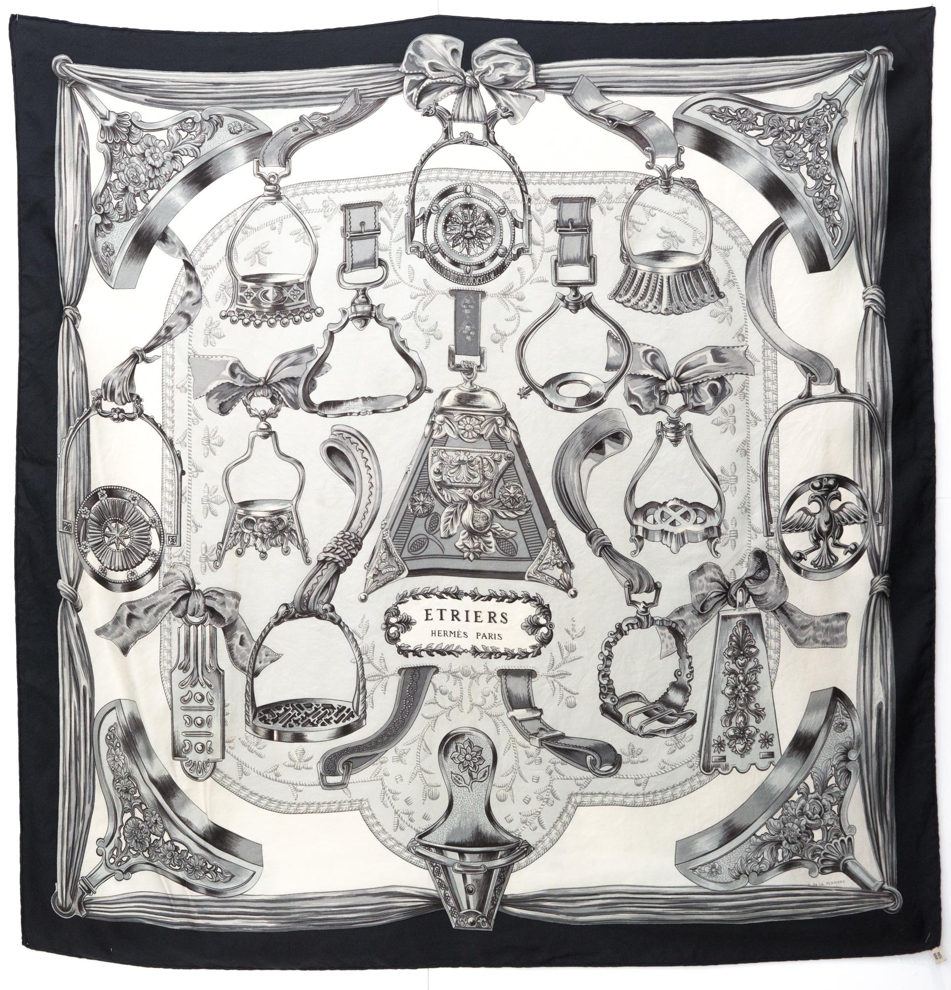 Hermes silk scarf “Etriers” F.de la Perriere featuring a black border, a Hermès signature. 
Circa 1964
In good vintage condition. Made in France.
35,4in. (90cm)  X 35,4in. (90cm)
We guarantee you will receive this  iconic item as described and