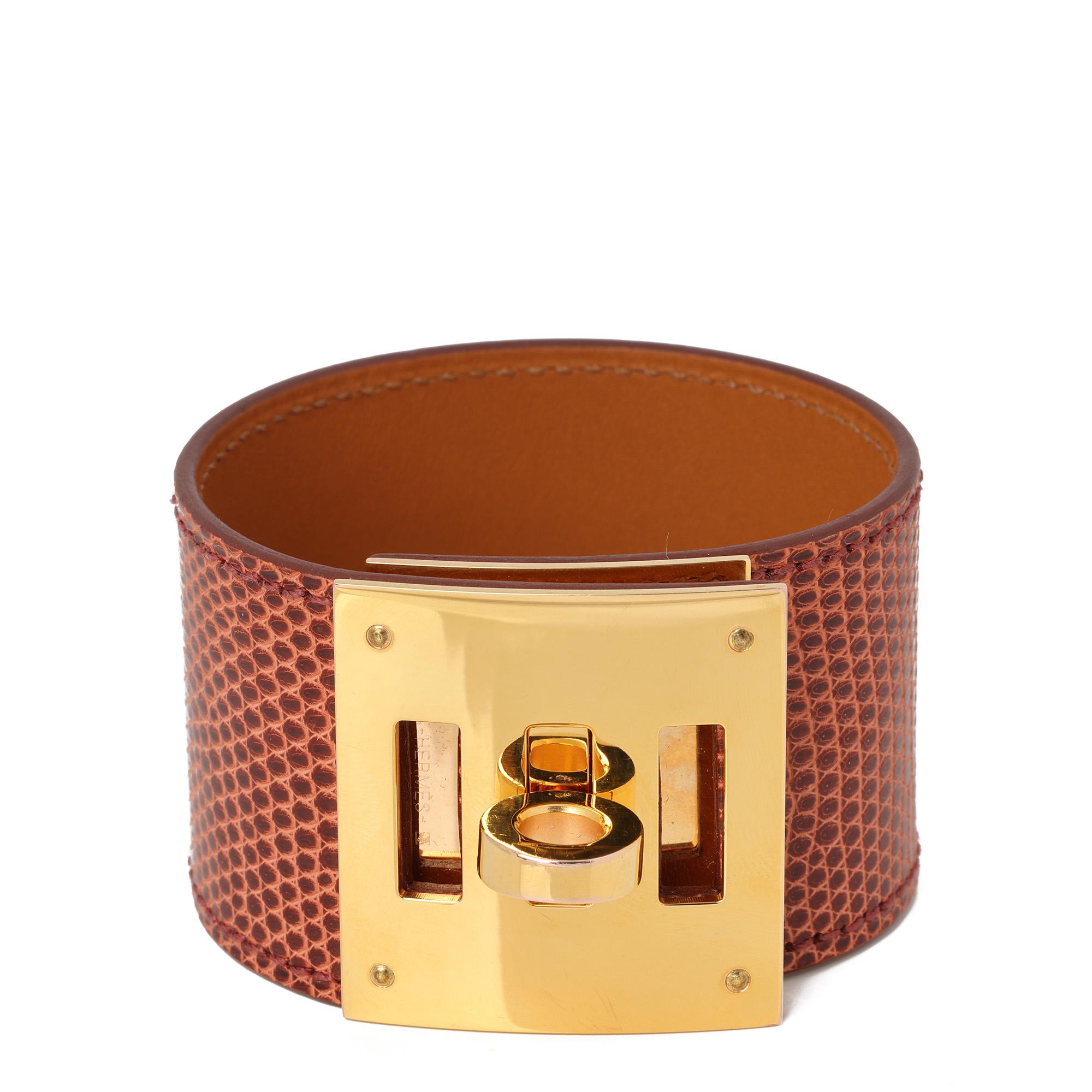 Hermès ÉTRUSQUE LIZARD LEATHER KELLY DOG BRACELET T2

CONDITION NOTES
The exterior in is exceptional condition with no signs of use.
The hardware is in exceptional condition with minimal signs of use.
Overall this item is in exceptional pre-owned