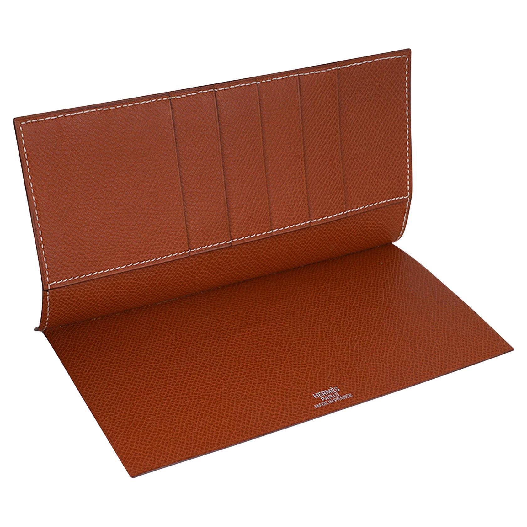 Mightychic offers an Hermes Vintage Card Case / Bill Fold featured in Gold Epsom leather.
The card holder has 4 slots for business/credit cards and 2 pockets.
Comes with signature Hermes box.
New or Store Fresh Condition.
final sale

CARD HOLDER