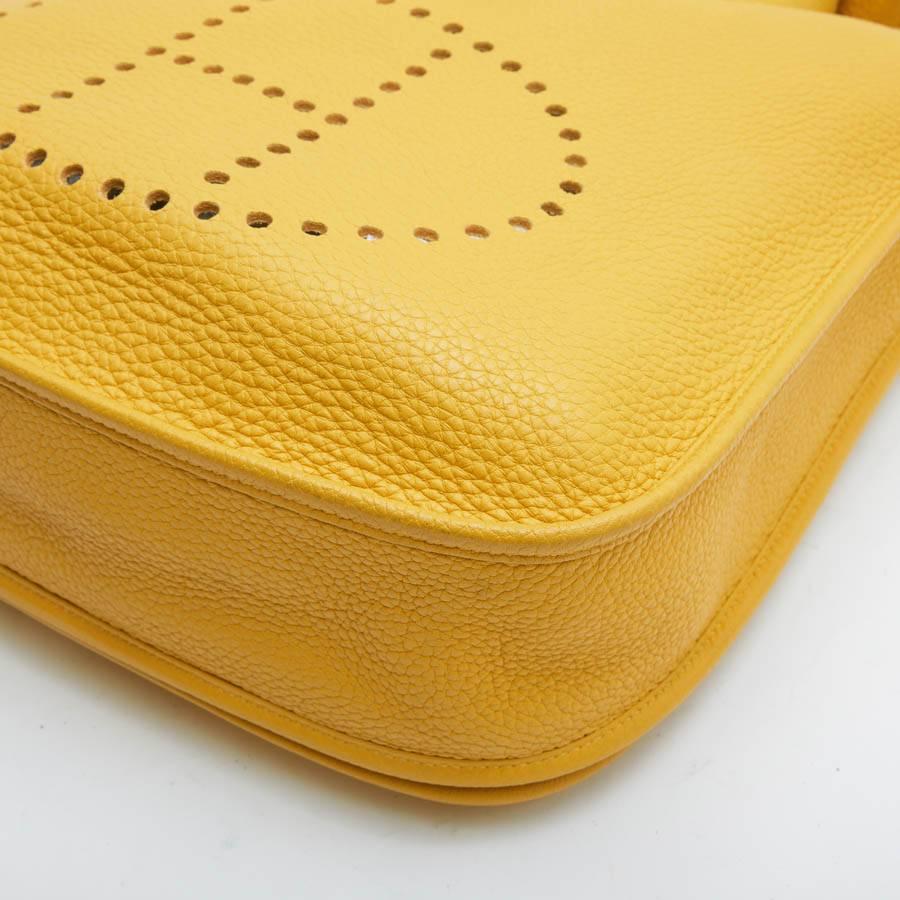 HERMES 'Evelyn II' Bag in Yellow Togo Grained Leather In Good Condition In Paris, FR