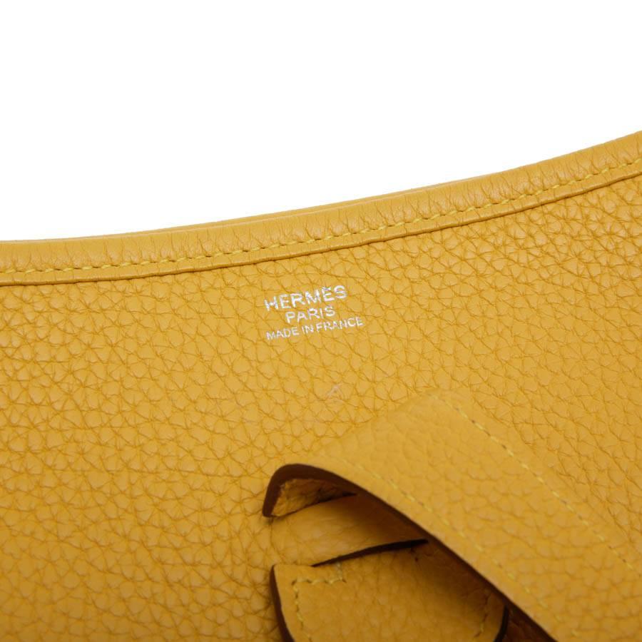 HERMES 'Evelyn II' Bag in Yellow Togo Grained Leather 4