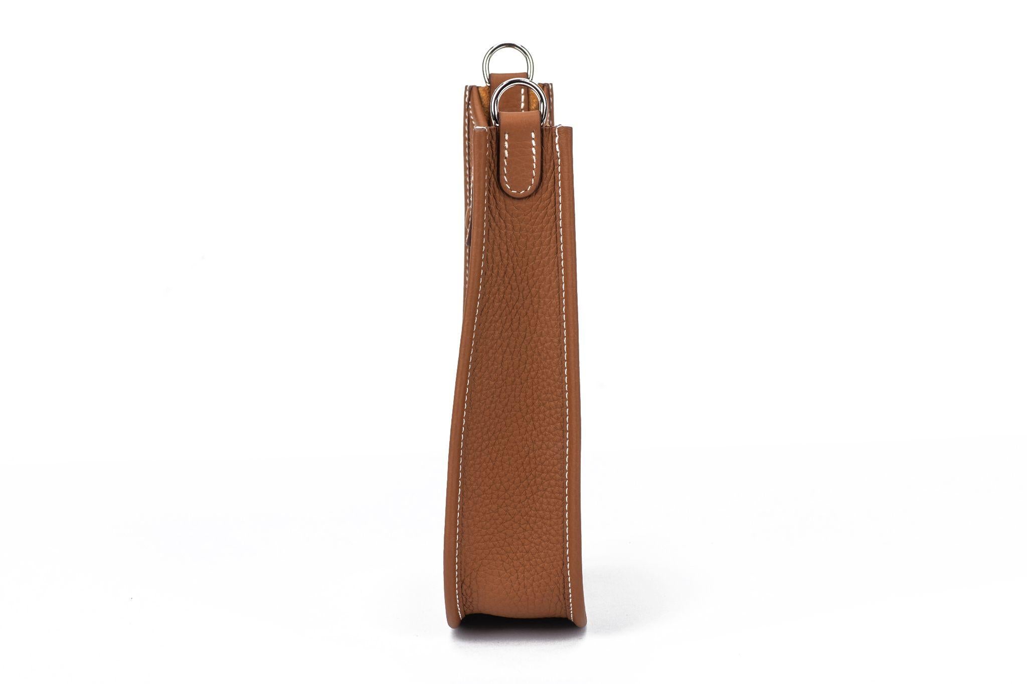 Hermès Evelyne 16 featuring amazone taurillon clemence leather. It comes with palladium silver hardware and has a shoulder strap made of fabric with a zick zack pattern. The bag is brand new. It comes with the original dustcover and box (box is