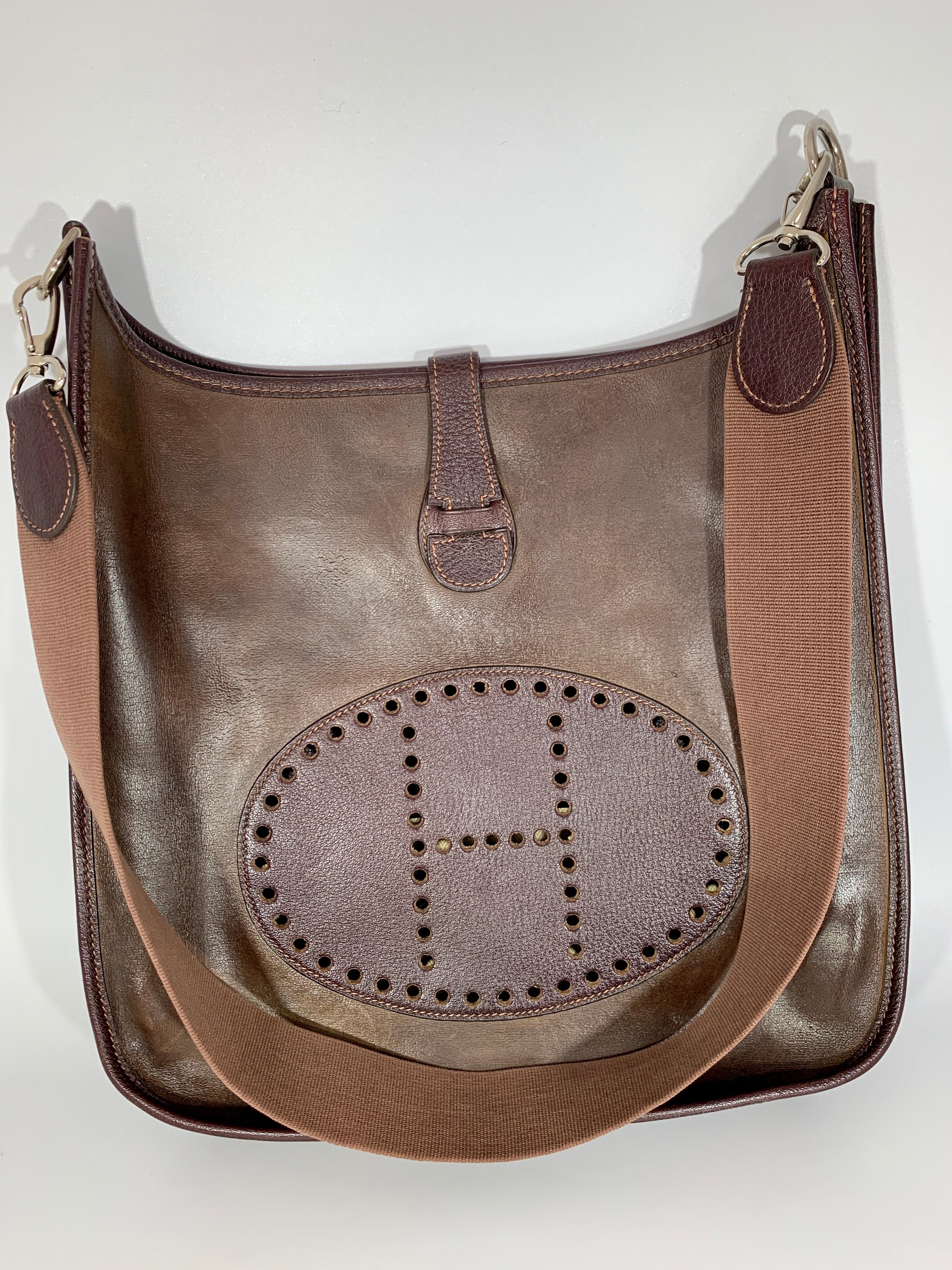 Hermes Evelyne shoulder bag
Dark Brown Leather bag 
embossed leather patch is Very Dark brown
One inside pocket 8 