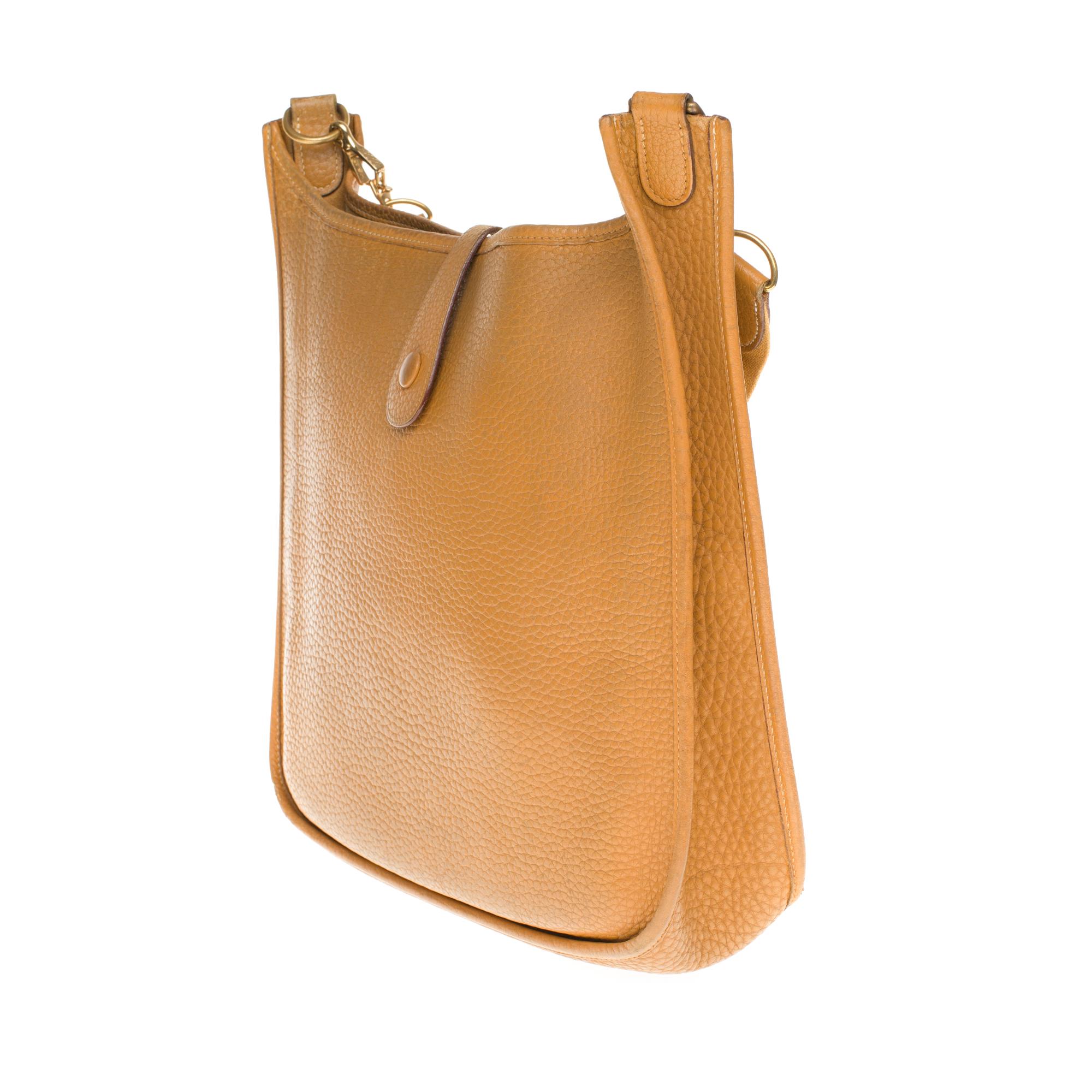 Hermes Evelyne GM Crossbody with strap in Taurillon gold Leather In Fair Condition In Paris, IDF