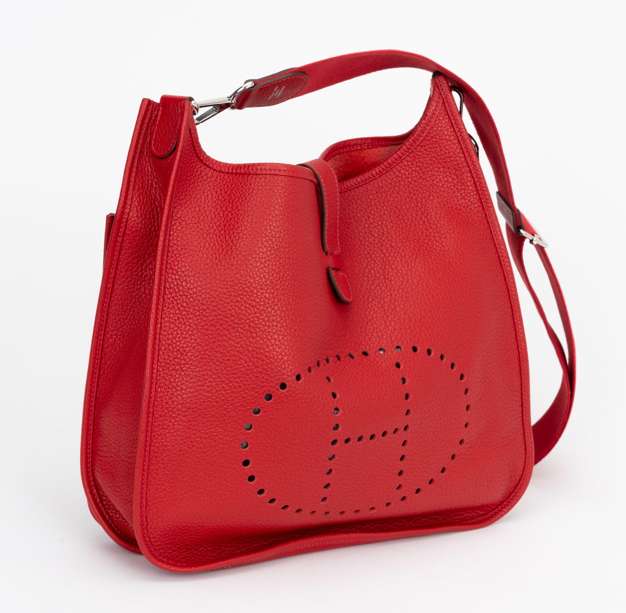 Hermès Evelyne GM in rouge casaque taurillon clemence leather and palladium hardware. Shoulder drop, 18