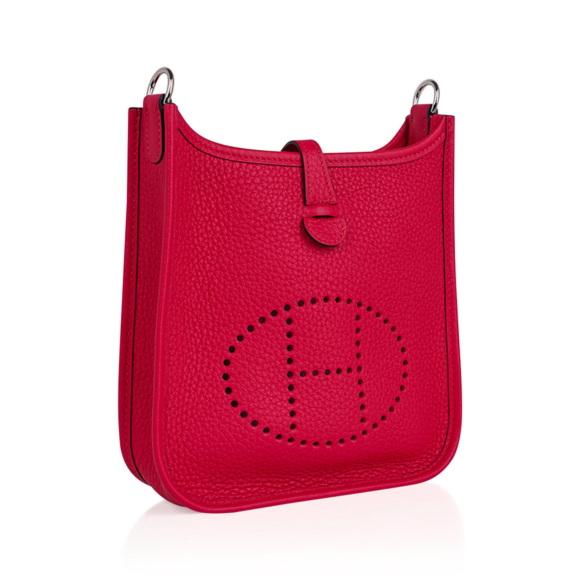 Mightychic offers an Hermes Evelyne TPM featured in saturated Framboise.
Whimsical with charming Flipperball strap.
Clemence leather is soft and scratch resistant.
Signature perforated H on front of bag.
Fresh with Palladium hardware.
Fabulous