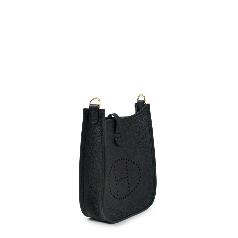 - Designer: HERMÈS
- Model: Evelyne
- Condition: Very good condition. 
- Accessories: Full set
- Measurements: Width: 17cm, Height: 18cm, Depth: 5cm, Strap: 111cm
- Exterior Material: Leather
- Exterior Color: Black
- Interior Material: Suede
-