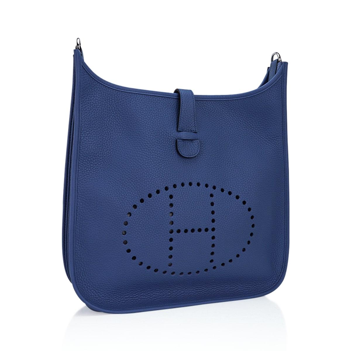 Mightychic offers an Hermes Evelyne GM featured in Blue Agate.
This beautiful blue is a perfect neutral for year round wear.
Fresh with Palladium hardware.
Fabulous shoulder or cross body bag with roomy interior and rear outside deep pocket.
Plush