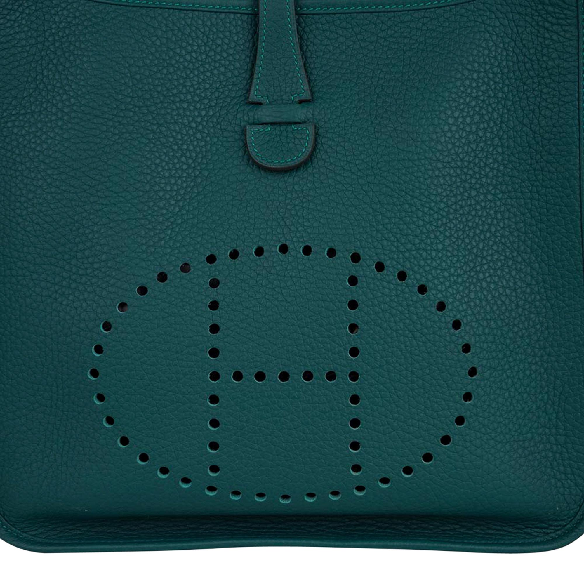 Mightychic offers a guaranteed authentic Hermes Evelyne PM featured in Malachite clemence leather.
Fresh with Palladium hardware.
Fabulous shoulder or cross body bag with roomy interior and rear outside deep pocket.
Sport strap in textile with