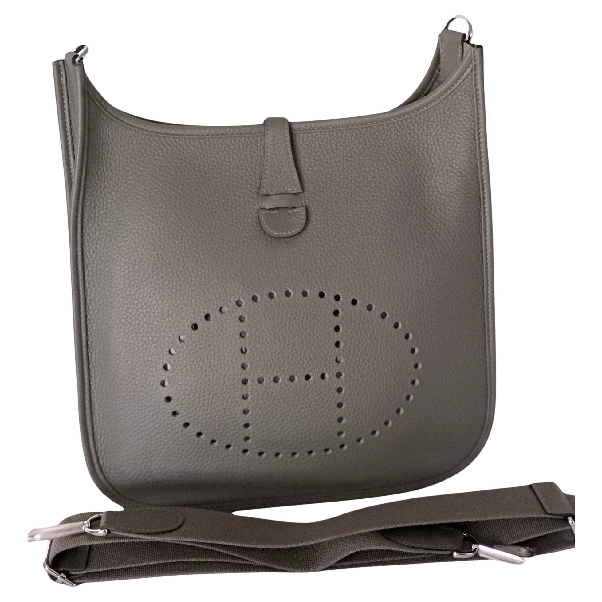 HERMÈS Kelly Touch 25 handbag in Black Togo leather and Lizard