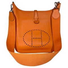 Hermès Evelyne Pm Oranges Leather Cross Body Bag, Excellent état