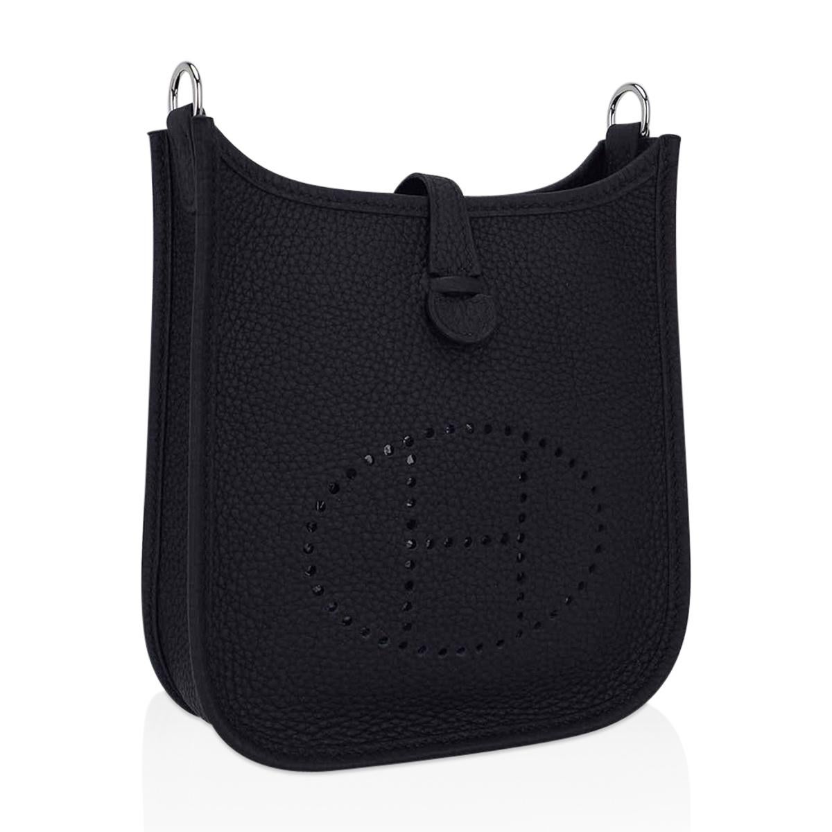 Mightychic offers an Hermes Evelyne TPM Black bag.
Cavale sport strap in Brown, Black, Blue and Ecru.
Black leather details and Palladium hardware accentuate the strap.
Clemence leather is soft and scratch resistant.
Signature perforated H on front