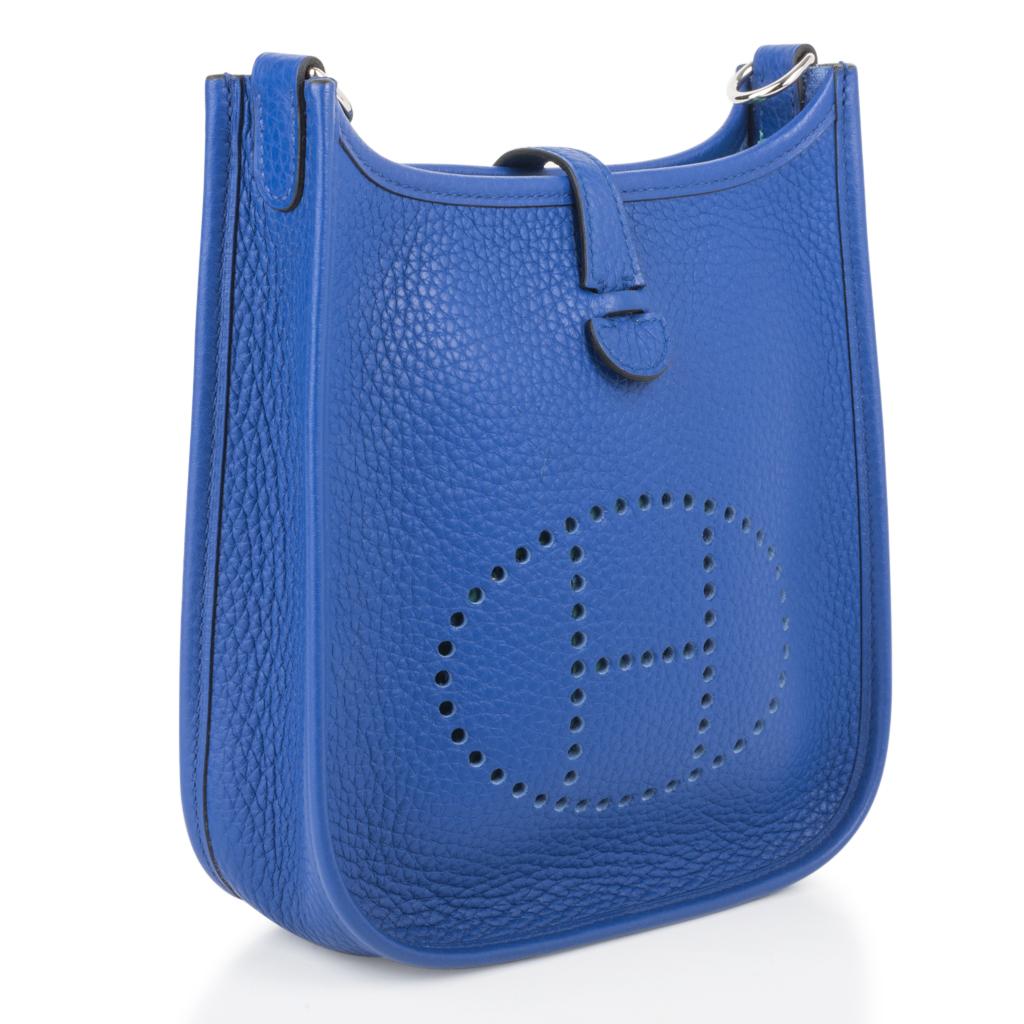 Guaranteed authentic Electric Blue Hermes Evelyne TPM Bag.  
Clemence leather is soft and scratch resistant.
Signature perforated H on front of bag.
Fresh with Palladium hardware.
Fabulous shoulder or cross body bag. 
Sport strap in textile with
