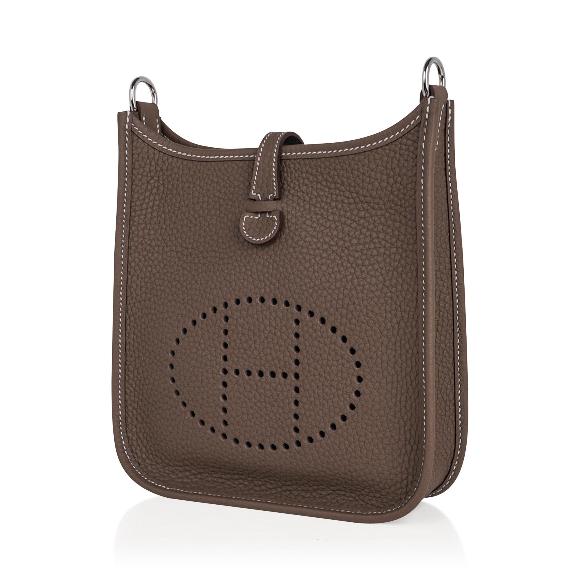 Mightychic offers an Hermes Evelyne TPM bag featured in neutral Etoupe.
Plush clemence leather and matching Etoupe canvas sport strap.
Signature perforated H on front of bag.
Fresh with palladium hardware.
Fabulous shoulder or crossbody bag. 
Sport