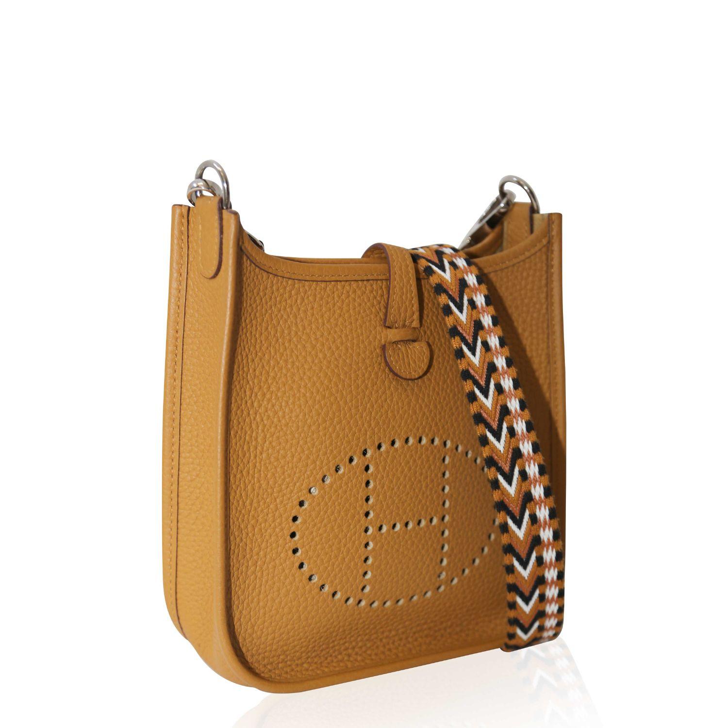 - Sesame Brown
- Signature perforated H logo
- Detachable shoulder strap
- Strap and press-stud fastening
- Main compartment
- Silver-tone hardware
- This piece comes complete with a protective dust bag.
- Stamp Y, 2020
- Strap Length: 55cm

Please