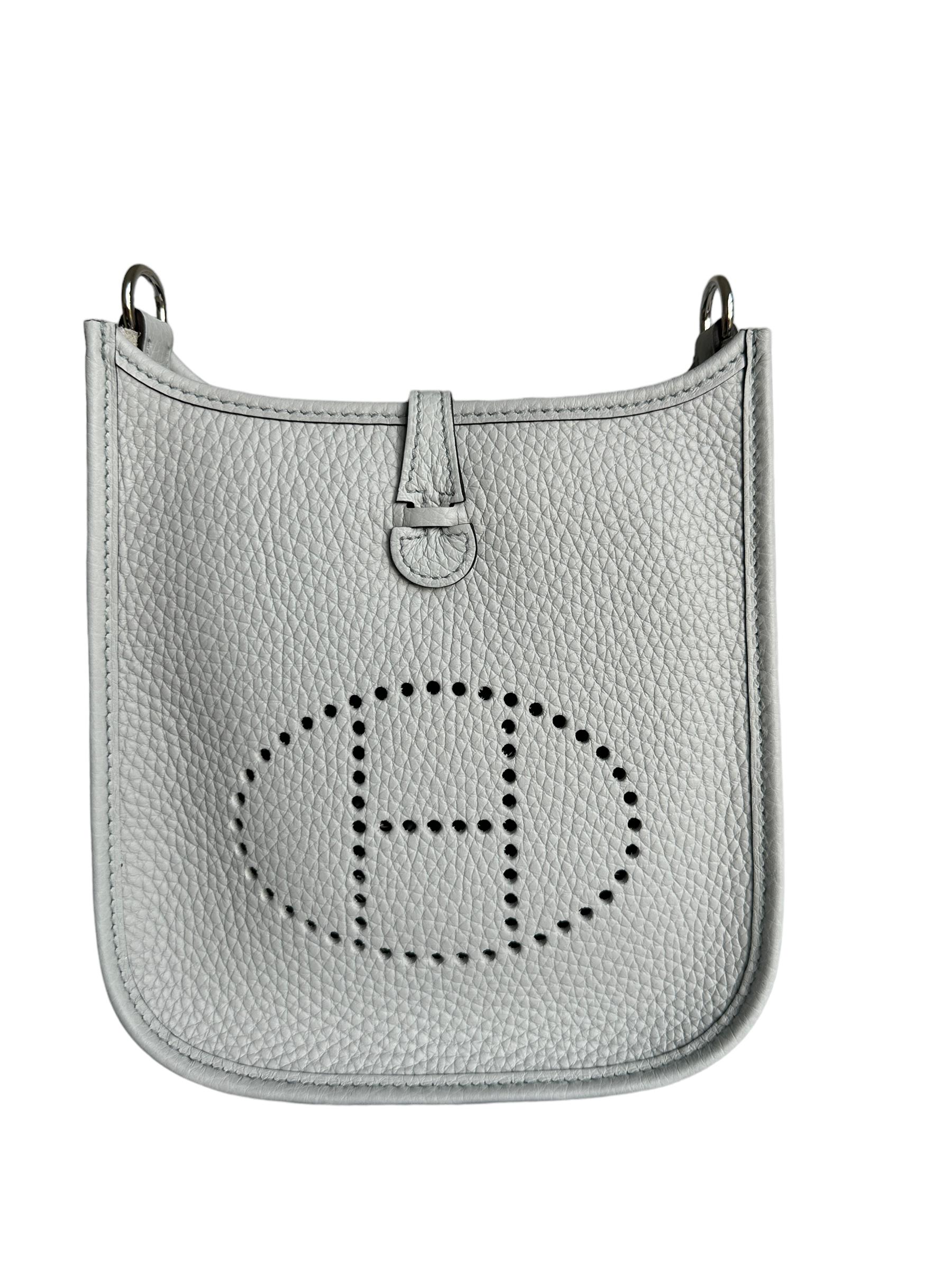 Hermes Evelyne Tpm 16
We have it in stock, ready, store fresh

This is the mini, the smallest size they make
Think spring summer
One of the prettiest colors
Blue Pale
Etain Strap

Collection B
2023
Natural  interior
Palladium  plated hardware
Hermes