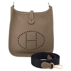 Hermes Evelyne TPM Etoupe Clemence Correa azul marino Herrajes dorados Nuevo c/Caja