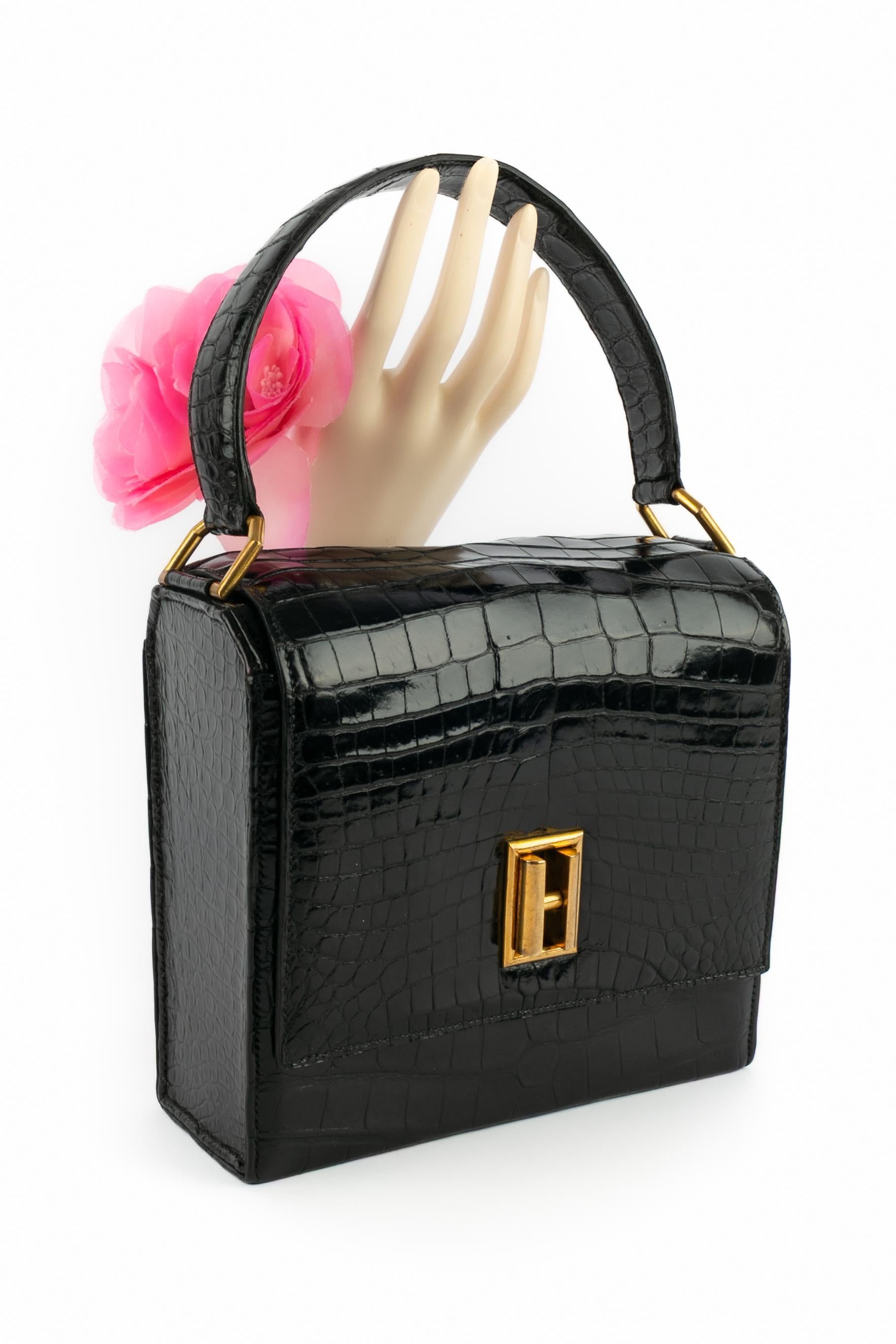 Hermès - (Made in France) Borsa in alligatore nero. Chiusura ad 