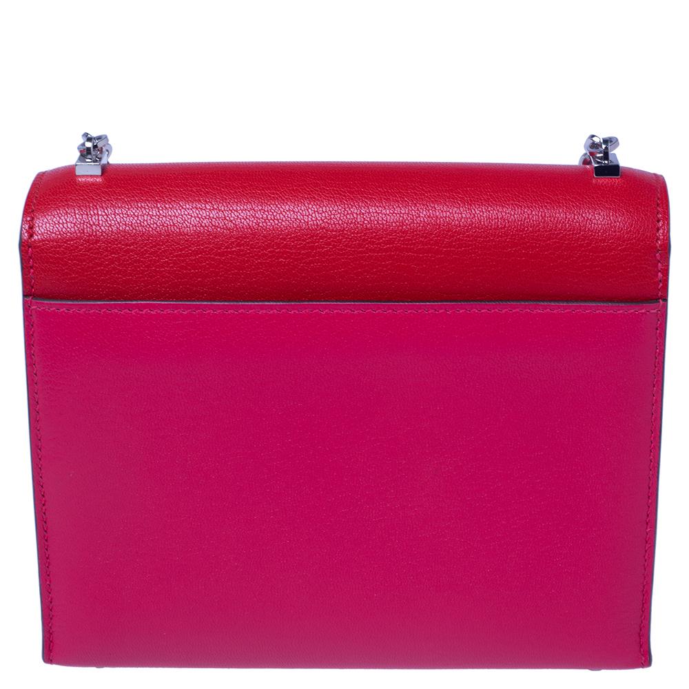 This Verrou Chaine bag by Hermes is hand stitched to perfection. It has a sharp-looking structure, clean lines and a flap front with a metal lock. Crafted from leather, the interior is meticulously designed to ensure your belongings will be found in