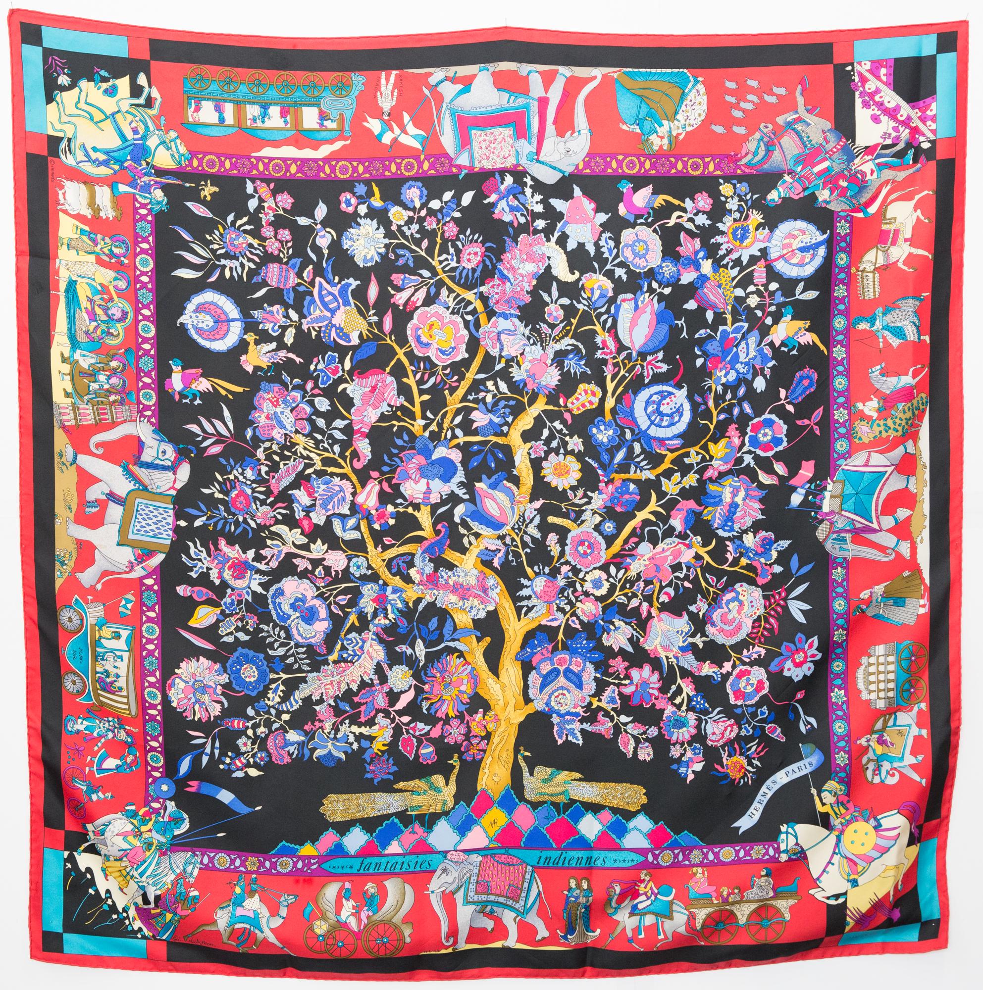 Hermes silk scarf Fantaisies indiennes » by Loïc Dubigeon featuring a red border and a Hermès signature. 
Rare 