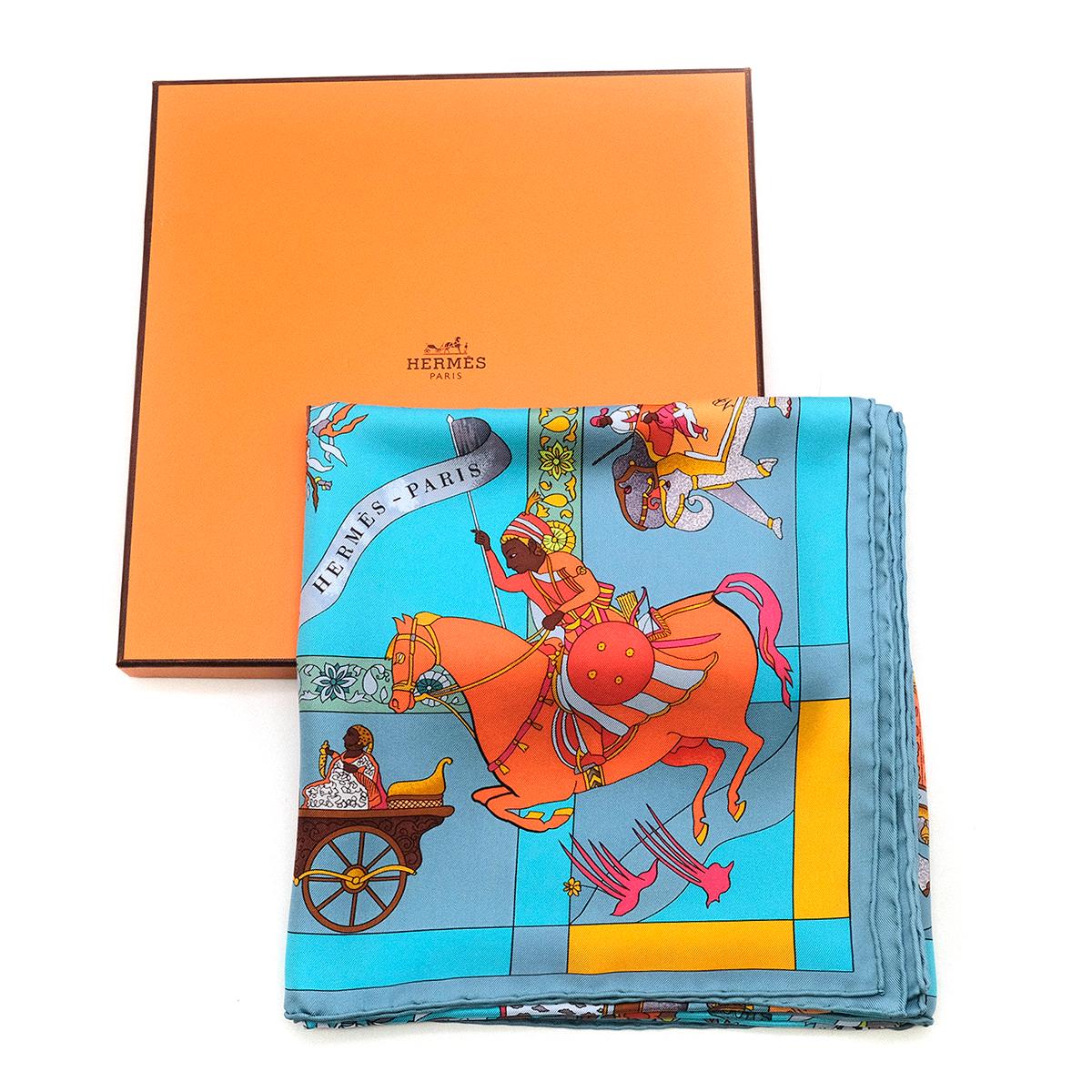 ermes Fantaisies Indiennes Silk Scarf 

- 100% Silk Scarf 
- Made in France
- This item comes with an original box 

The border of the “Fantaisies Indiennes” scarf is decorated with figures and animals from the frescoes and murals of the Shekhawati