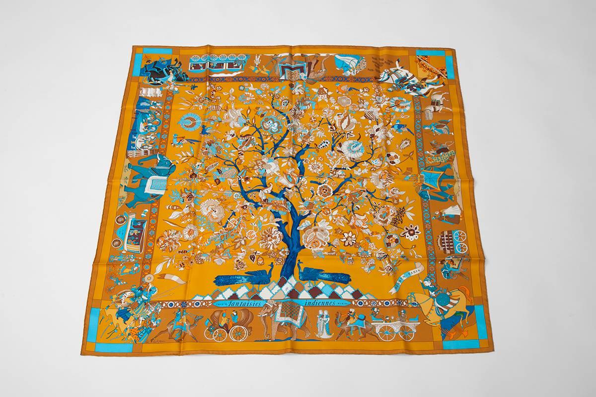 Designed by Loïc Dubigeon, first issued in 1985-1986 and re-edited during the nineties and the early 2000, the “Fantaisies Indiennes” carré scarf remains a rare find for any serious Hermès collector. This one is exceptionally beautiful because of