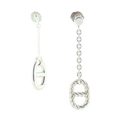 Hermès Boucles d'oreilles Farandole en métal de couleur argenté