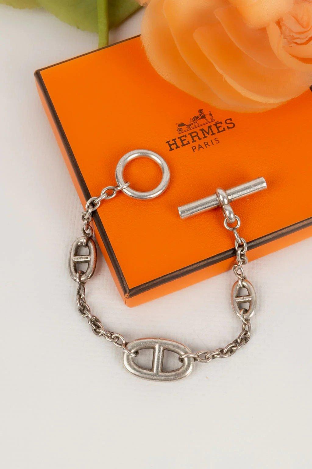 Hermes -(Fabriqué en France) Bracelet en argent modèle Farandole.

Informations complémentaires :

Dimensions : 
Longueur : 18 cm

Condit : Très bon état.

Numéro de référence du vendeur : BRA32