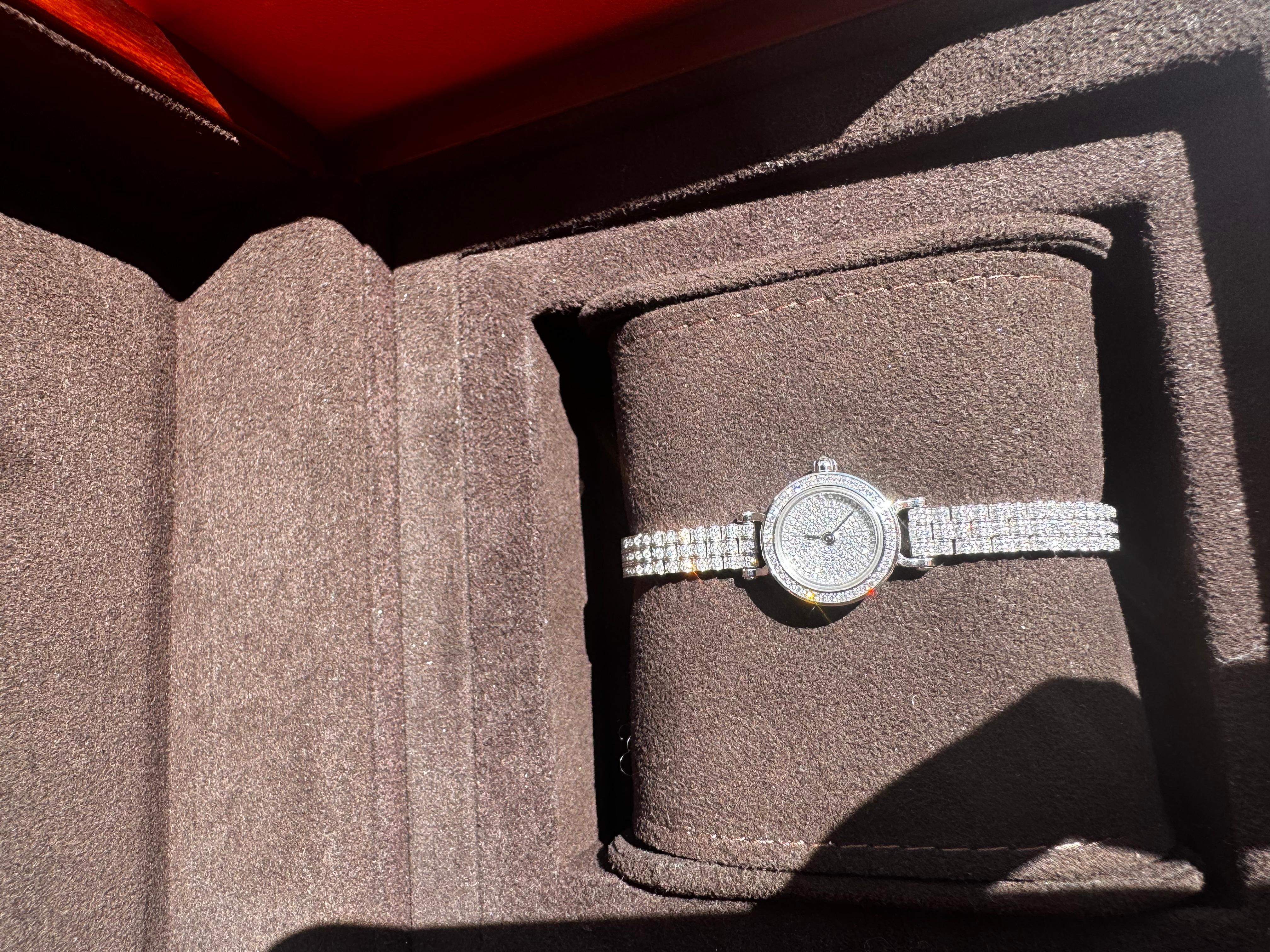 Hermes Diamond-set white gold watch, quartz movement, diamond-set white gold dial, bracelet in diamond-set white gold.  18ct White Gold

Diamond-set white gold case, 16 mm, set with 152 diamonds (0.582 ct)
Anti-glare sapphire crystal
Diamond-set