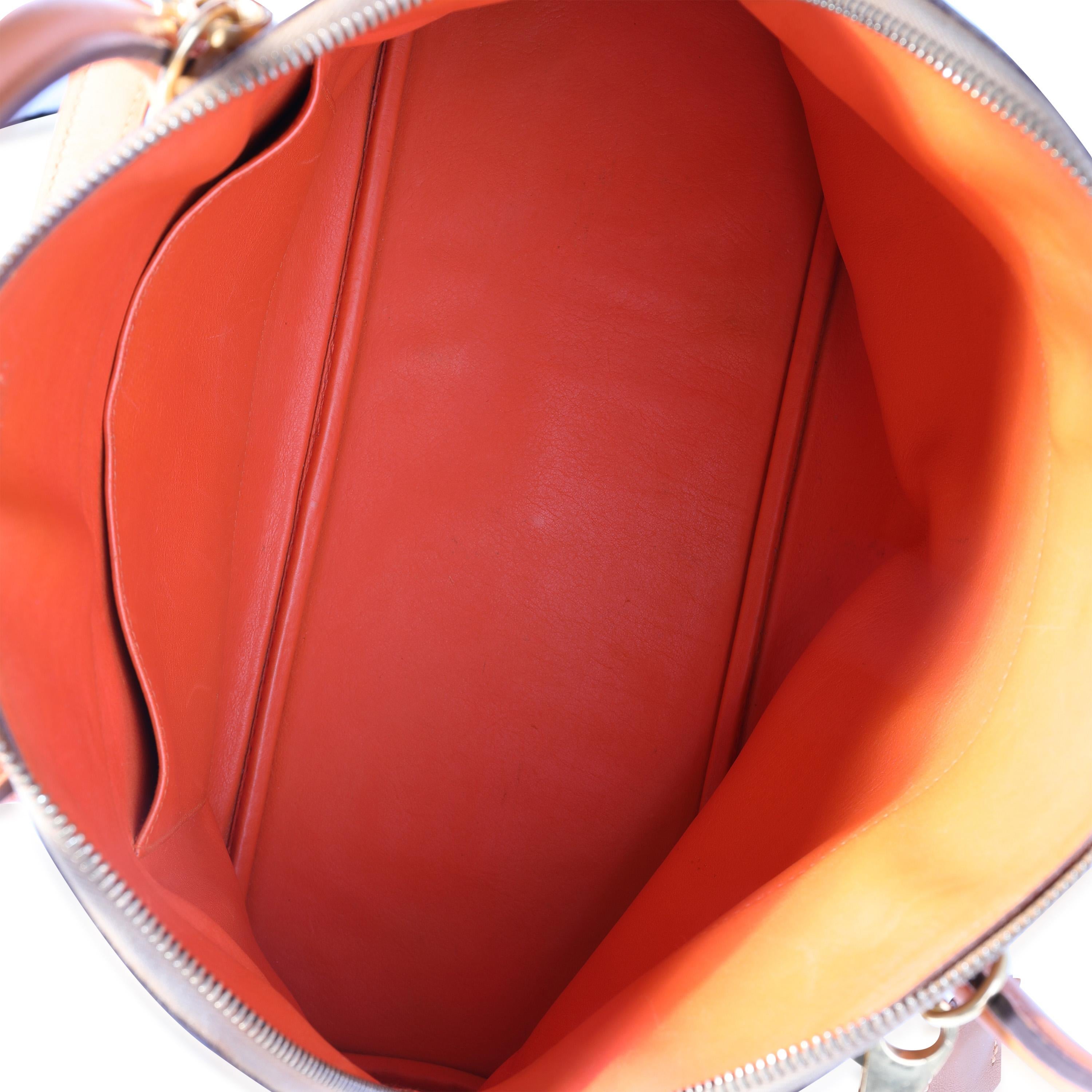 Listing Title: Hermès Fauve & Feu Barenia Bolide 35 GHW
SKU: 117669
Condition: Pre-owned
Handbag Condition: Very Good
Condition Comments: Very Good Condition. Light scuffing to corners. Indentations to base. Light scuffing to exterior. Scratching