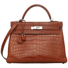 Hermes fauve Niloticus matte crocodile leather Kelly Retourne 32 Bag