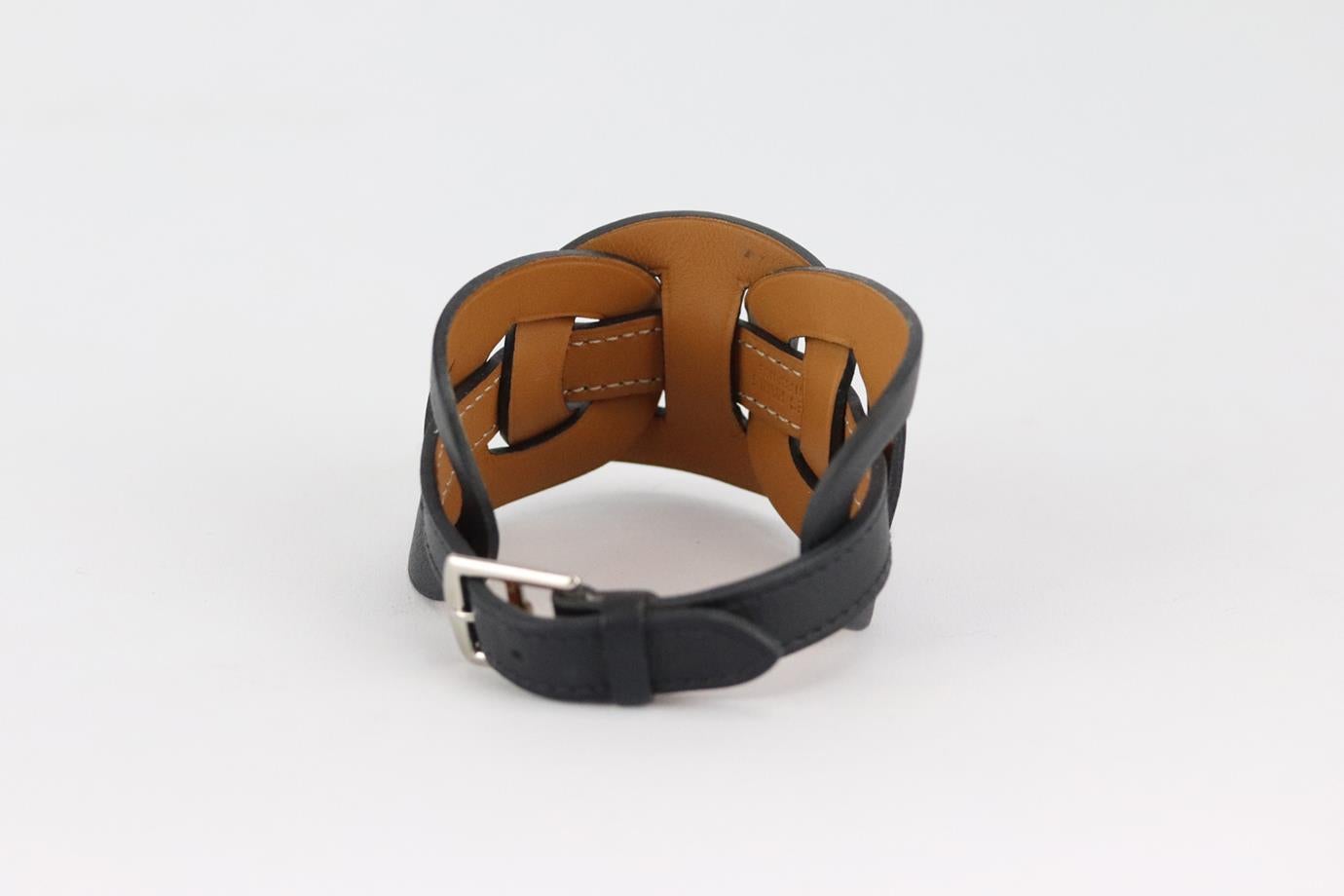 Hermès Fétiche leather bracelet. Black. Buckle fastening at back. Does not come with box or dustbag. Min. Length: 7.5 in. Max. Length: 8.5 in. Very good condition - Light sign of wear; see pictures.
