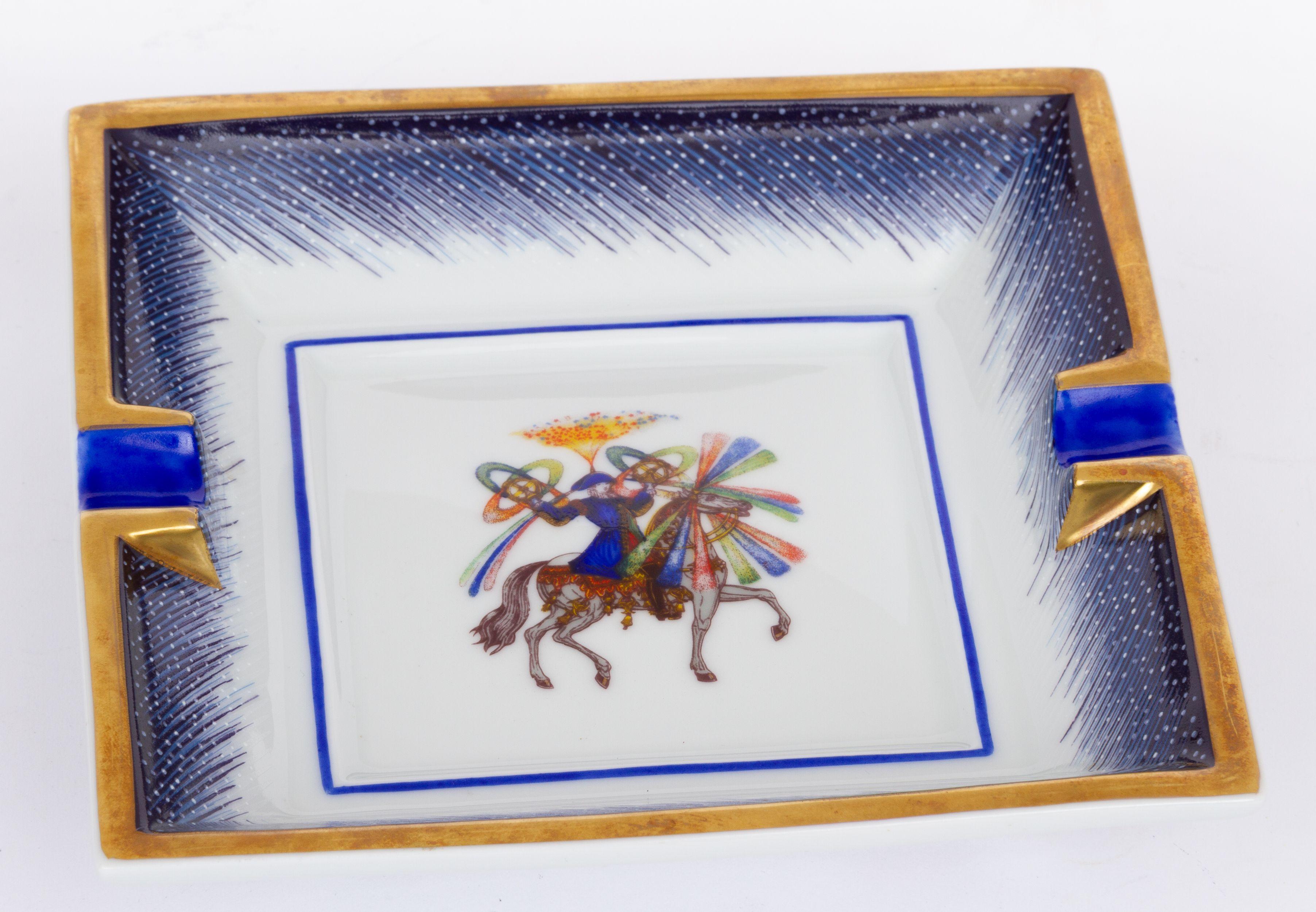 Hermès vintage porcelain ashtray in blue. Collectible feux d artifice design. The piece is in excellent condition.
