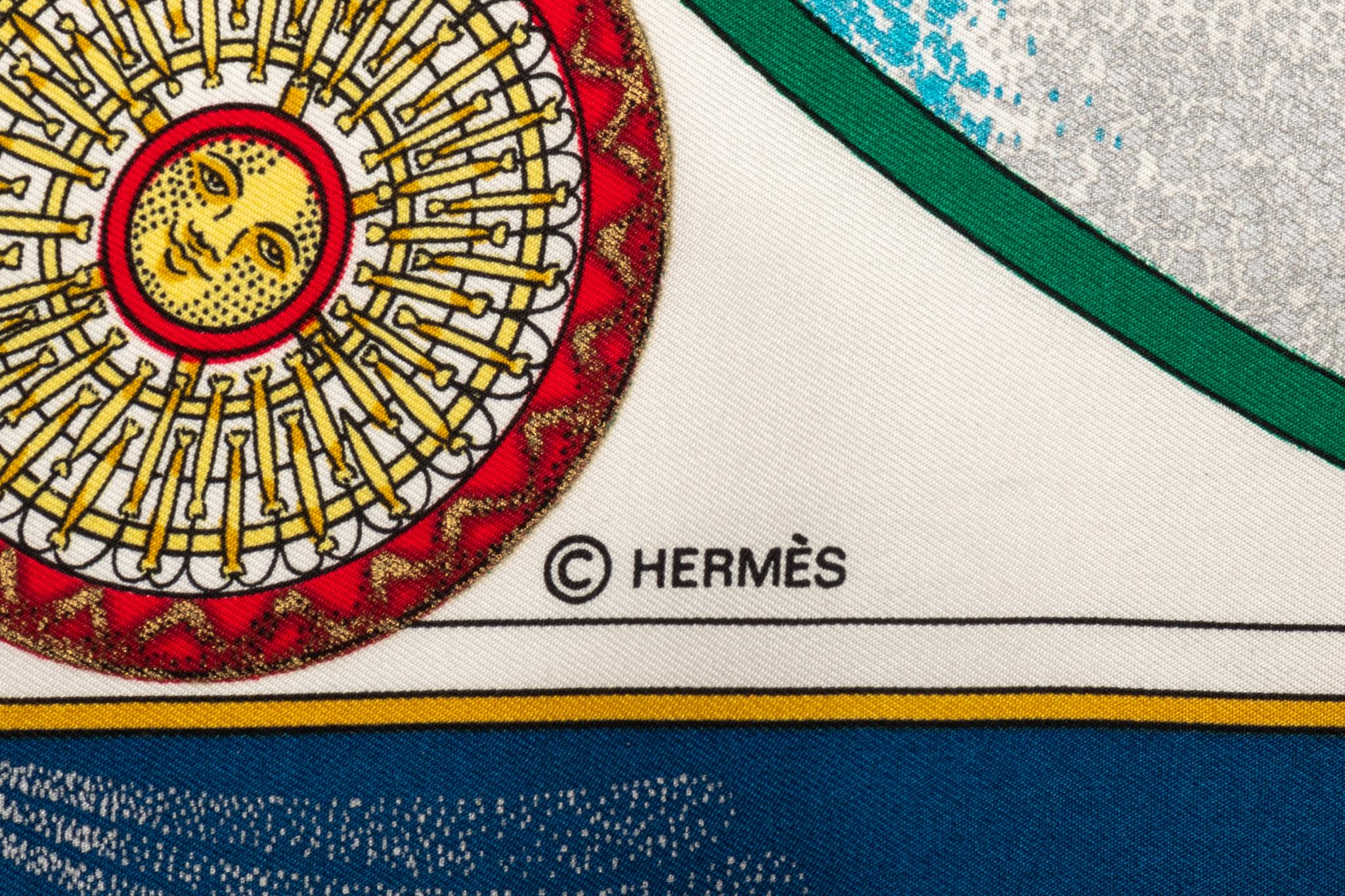 Hermès new blue feux d artifice silk gavroche scarf. Hand rolled edges. Highly collectible design .