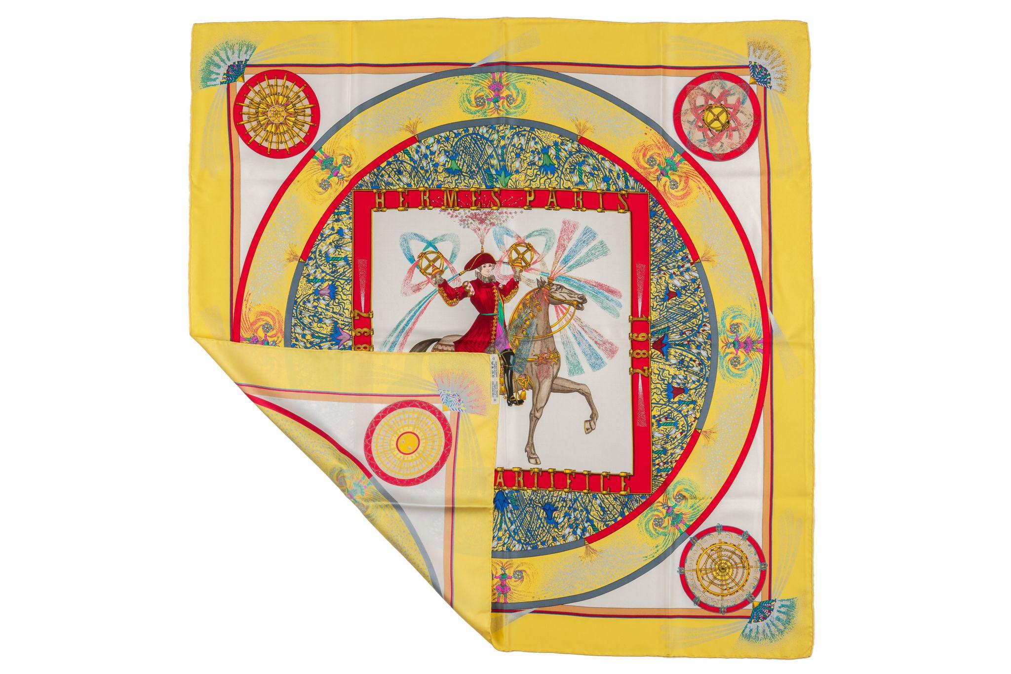 Hermes, Feux D'Artifice, 100% Silk Scarf by Michel Duchene. The scarf is a special issue to celebrate 150th anniversary of Hermes. Features hand rolled hem. Comes with no box.