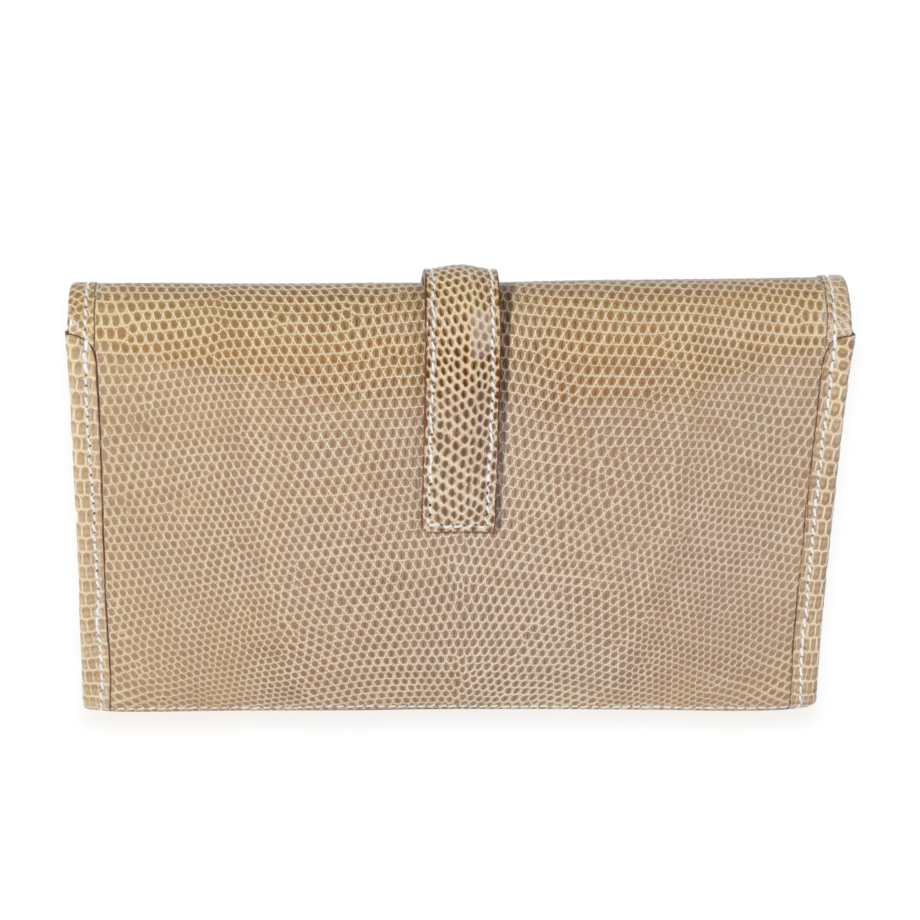 Listing Title: Hermès Ficelle Lizard Mini Jige
SKU: 119769
Condition: Pre-owned (3000)
Handbag Condition: Very Good
Condition Comments: Slight yellowing to lizard skin  Please note: this item can not be shipped to all areas.
Brand: Hermès
Model: