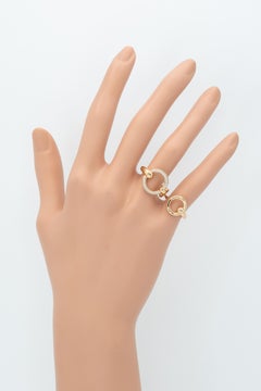 Bague double doigt Hermès « Filet d’Or » en or rose 18 carats, pavée de diamants, française