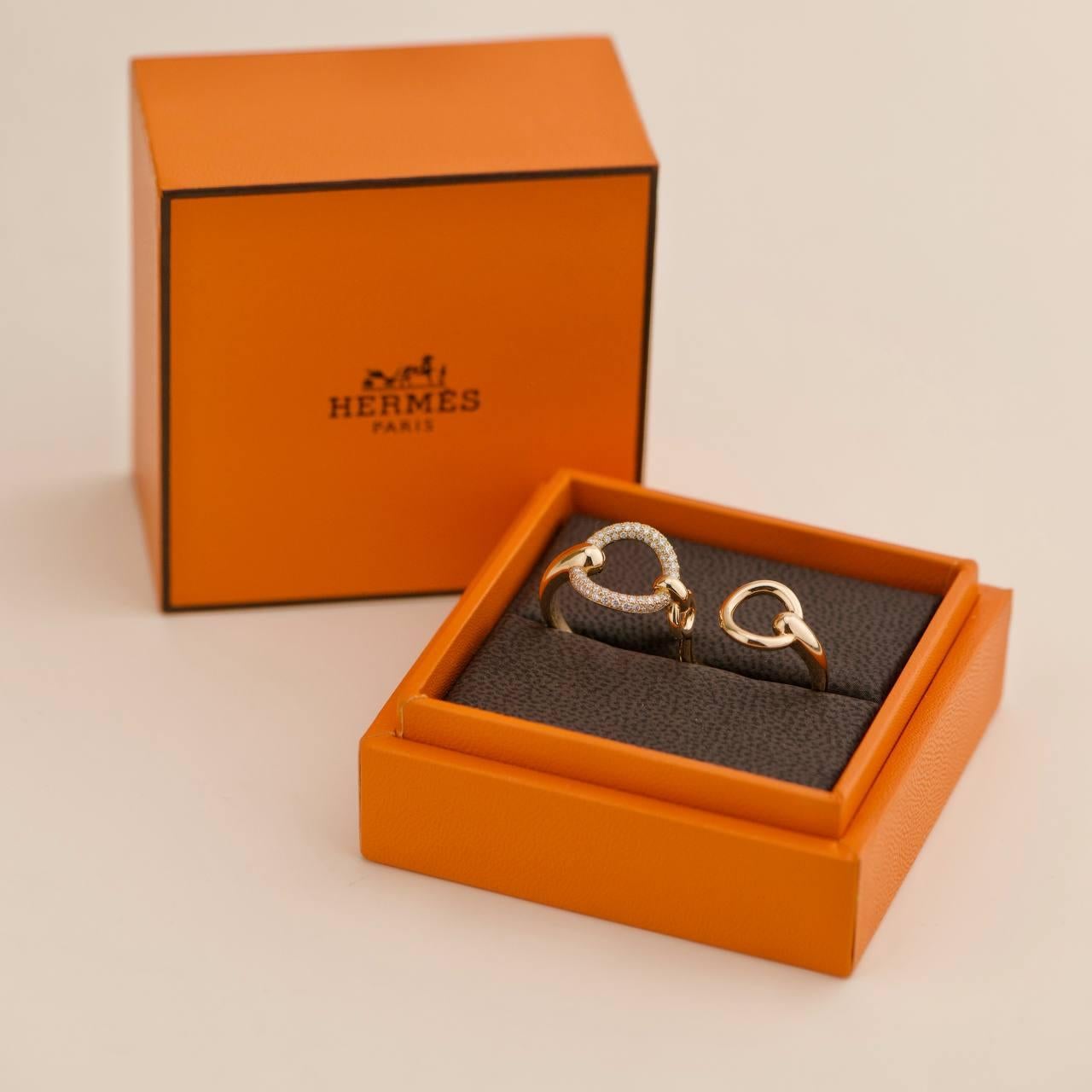 SKU	33301711
Livré avec	Boîte uniquement
Modèle	Filet d'Or Double
Numéro de série	15P080295
Métal	Or rose 18k
Pierres	Diamant
Poids total des diamants	0,43ct environ
Poids	9.31 g
Taille de l'anneau 	54 (UK : N, US :