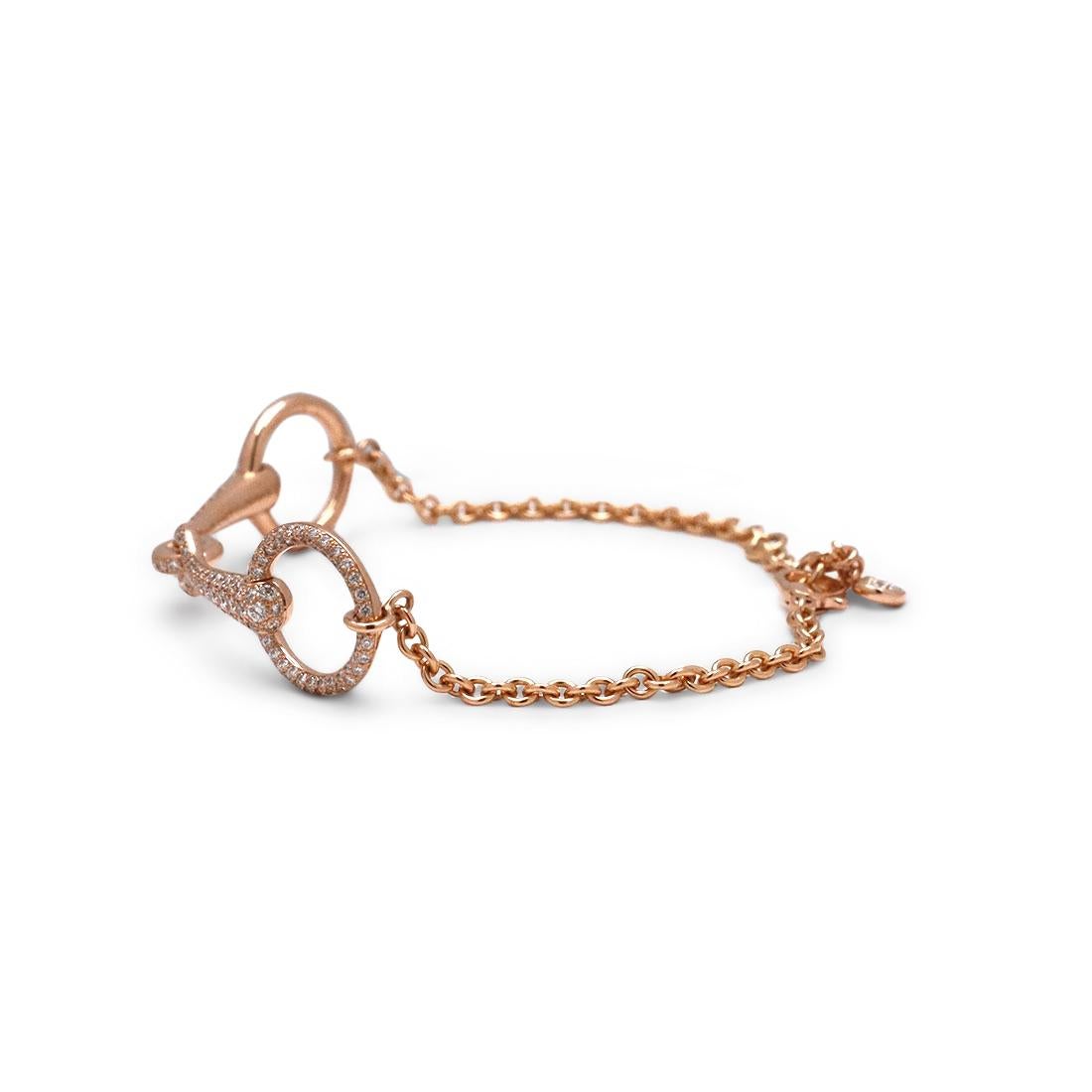 Authentic Hermès ‘Filet d’Or’ bracelet crafted in 18 karat rose gold and pave set with approximately .96 carats of high-quality diamonds. Featuring a whimsical equestrian theme, the bracelet measures 6.2 inches in length. Signed Hermès, ST, Made in