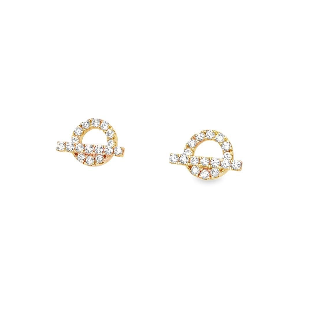 Beautiful earrings crafted in 18k rose gold set with diamonds by famed designer Hermes. 
From the Finnese collection, a Hermès icon, the signature toggle clasp becomes a motif with this signature design. 
The earrings measure 0.58