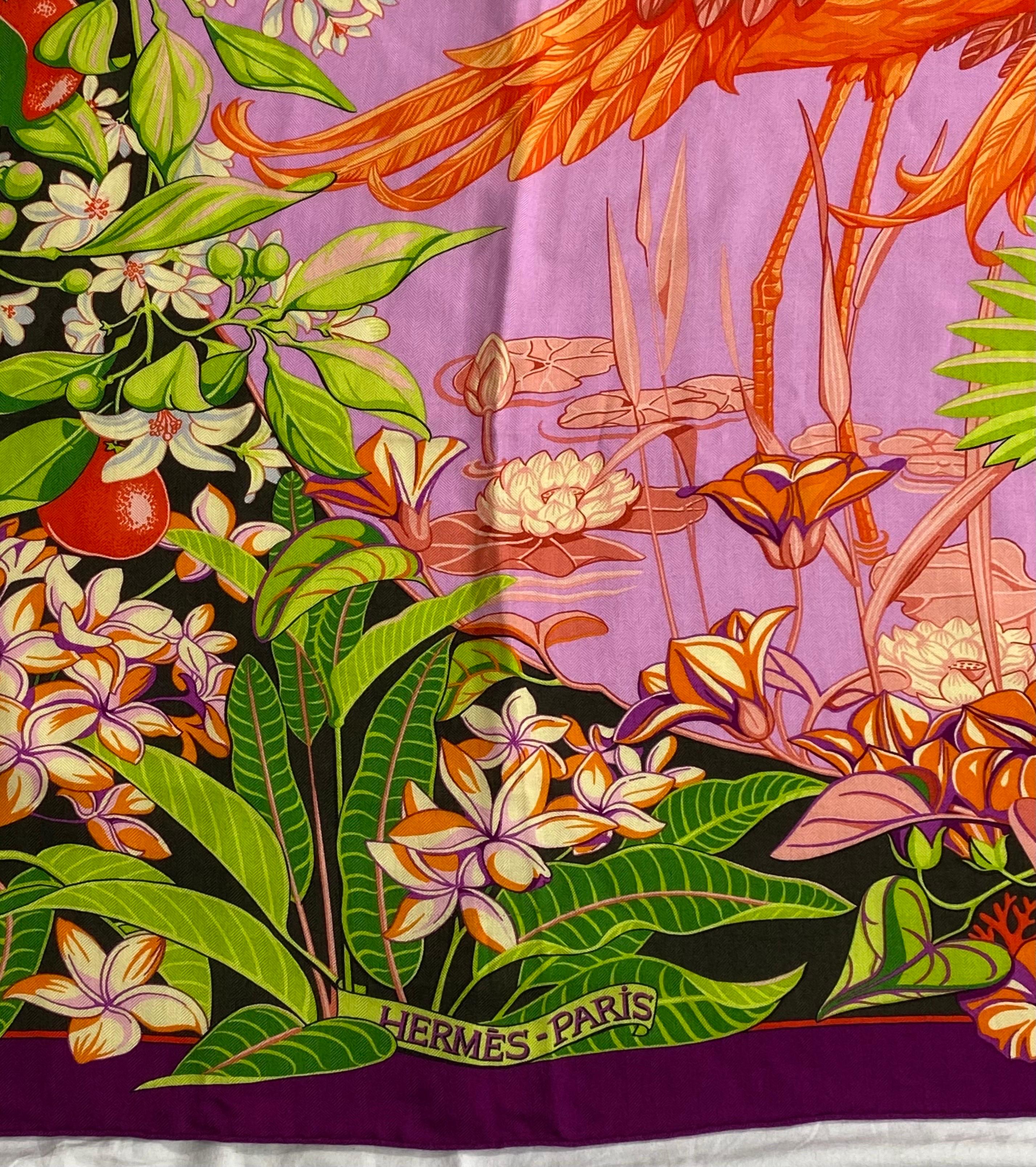 Hermes “FLAMINGO PARTY” multi color cashmere 140 cm large shawl. The largest of the Hermès scarf line, the Hermès 140cm shawl measures approximately 55 inches on each side and is made from the softest silk and cashmere. This particular one has