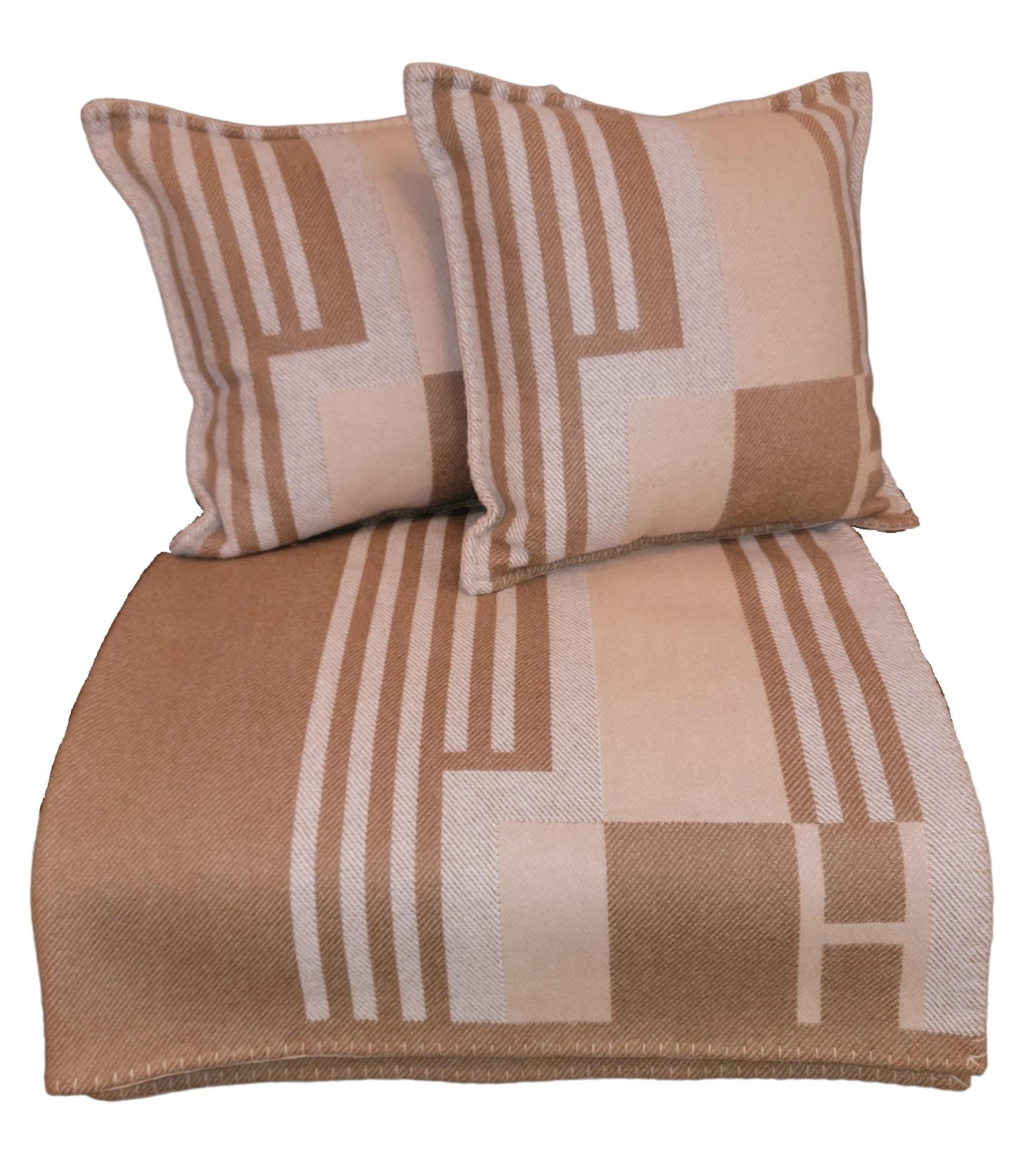 Avalon Vibration Throw  Wool Hermes Blanket and matching pillows that are made in France to be soft and plush while keeping you stylish and warm. May be used as a throw over a sofa or as a bed spread. Wonderful design. 
Blanket measures roughly 55 x